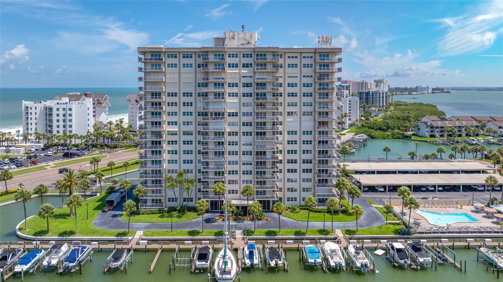 Beach living at its best! This beautiful 2- bedroom, 2-bath condominium features a desirable split floor plan and offers breathtaking views in every direction. Wake up to Intracoastal sunrises and unwind each evening with spectacular Gulf sunsets. Available furnished or unfurnished, this residence is ready for you to enjoy Florida's coastal lifestyle.
The community offers an impressive array of amenities designed for both relaxation and recreation. The clubroom features space for those who like to enjoy card games, mahjong, super bowl gatherings and TGIF events and other community activities. Residents also enjoy a fitness center and billiards table. 
Outdoor enthusiasts will appreciate the solar- heated swimming pool, grilling area, private lawn space, bicycle storage, boat slip rentals and a convenient fish -cleaning station.
Experience all that paradise has to offer in this exceptional waterfront community. Conveniently located just one mile from the Sand Key Plaza, you'll enjoy easy access to upscale shopping, dining and everyday conveniences.
Come discover the perfect blend of coastal beauty, resort-style amenities, and an unbeatable location.
