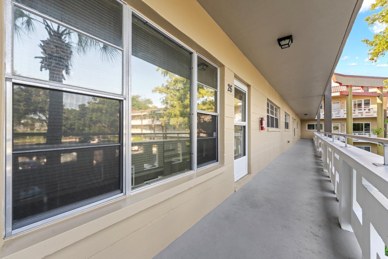 Welcome to On Top of the World, one of Clearwater's most sought-after 55+ communities! This beautifully maintained 2-bedroom, 2-bathroom condo is perfectly positioned to enjoy peaceful golf course views from the front windows while being just a short stroll from the community pool and recreation center.
Inside, you'll find a bright, open great room with low-maintenance flooring, elegant wainscoting, and charming Tiffany-style lighting that adds warmth and character. The updated kitchen features white cabinetry, granite countertops, stainless steel appliances, a modern tile backsplash, and plenty of cabinet space, making it both stylish and functional.
The oversized primary suite offers a relaxing retreat with an updated en-suite bathroom featuring a beautiful step-in shower. A spacious secondary bedroom is conveniently located near the full guest bath, providing comfort and privacy for family or visitors.
One of the highlights of this home is the expansive 25-foot enclosed Florida room—the perfect place to enjoy your morning coffee, entertain guests, or simply relax year-round.
Living in On Top of the World means enjoying an incredible array of amenities, including golf course views, fitness centers, swimming pools, tennis and pickleball courts, shuffleboard, a dog park, hobby clubs, and countless social activities. Your monthly condo fee also includes water, sewer, trash, cable, and exterior maintenance, making for truly carefree living.
Conveniently located near shopping, restaurants, medical facilities, and entertainment, you're also just a short drive from award-winning Clearwater Beach, where you can enjoy breathtaking sunsets, white sand beaches, and everything Florida's Gulf Coast has to offer.
Whether you're looking for a full-time residence or a seasonal retreat, this move-in-ready condo offers the perfect combination of comfort, convenience, and an active Florida lifestyle.