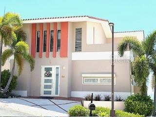 Exquisite Three-Level Mansion in Palmas del Mar !!!

Discover the elegance of this stunning three-level residence, perfectly positioned on one of the highest points of Palmas del Mar to capture spectacular panoramic ocean views from multiple areas of the home.

Featuring three spacious bedrooms, two full baths and two half bathrooms, this property combines comfort and sophistication. Enjoy refreshing cross-ventilation that enhances the natural flow of Caribbean breezes, while the gourmet kitchen with granite countertops provides the perfect setting for both casual dining and elegant entertaining. The kitchen features stainless steel appliances. Also a gas generator provides peace of mind. This residence has a designated area for installing an elevator if needed. It also features storm shutters and a water purification system. This unique property offers open spaces designed for creating lasting memories with your family, enhanced by natural ventilation throughout. 

Set on two expansive lots of 620 square meters, that allows room to expand with multiple outdoor areas or even add a pool to make it your private oasis. This charming home offers an unmatched sense of privacy and space, surrounded by the beauty of one of the most exclusive neighborhoods within Palmas del Mar, Humacao—a world-class, resort-style community.

 Explore miles of scenic golf cart paths, tee off on two championship golf courses, or set sail from the world-class marina. For the active lifestyle, enjoy the equestrian center, tennis and pickleball courts, and a wide selection of dining and shopping options. Families will appreciate the presence of The Palmas Academy, a highly regarded private, college-preparatory school serving students from pre-K through 12th grade—all within the gates of the community. Don’t miss out on this fantastic home!

Whether as a primary residence or a vacation retreat, this home embodies the very best of luxury Caribbean living.
Schedule your private tour today and experience Palmas del Mar at its finest!