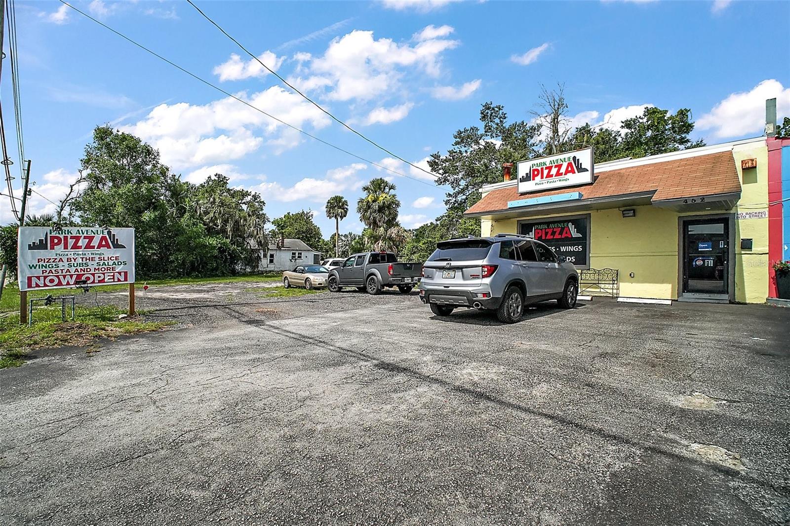 Inside Apopka city limits on the Park Ave corridor, 452 & 438 Park Ave are offered together with the option to add 454 Park Ave for a larger footprint. Zoned C-C (Community Commercial)—a flexible district for neighborhood-serving retail, office, and mixed-use (buyer to verify)—the offering includes an existing restaurant building at 452 Park Ave ready for re-use or future redevelopment, plus 438 Park Ave with land and a structure of no contributory value that’s ideal for parking, expansion, or new vertical (approvals required). Combine all three for an estimated ±1.30 (buyer to confirm via survey/OCPA). Enjoy high-visibility frontage with quick connections to SR-429/Wekiva Parkway, US-441, and SR-414, placing you near Mount Dora and just northwest of Orlando. Apopka is one of Central Florida’s fastest-growing cities, with the City reporting a strong year-over-year population jump—supporting demand for community-serving uses. Buyer to verify all measurements, utilities, access, impact fees, and approvals with the City of Apopka.  Call today for your private showing