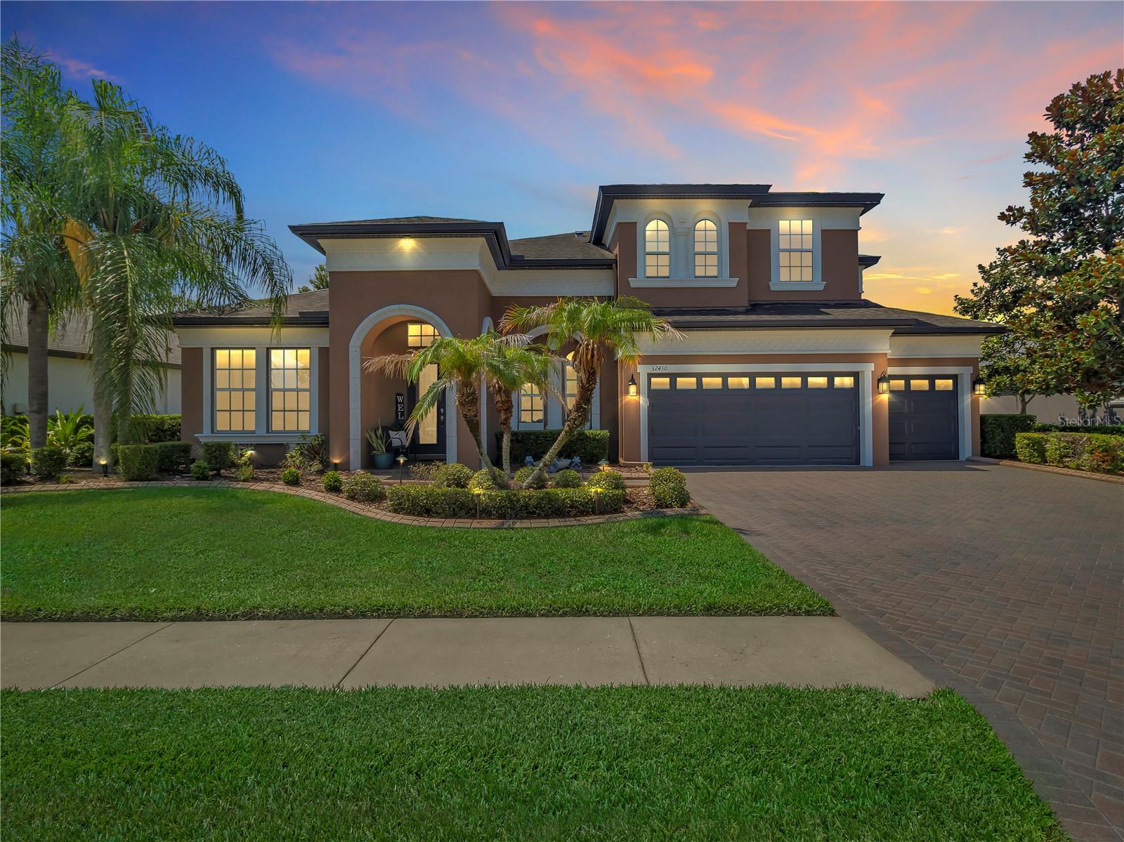 NOT ALL LUXURY HOMES ARE CREATED EQUAL!! Some are simply beautiful while others are designed to make life easier, smarter, & more enjoyable every single day!! This exceptional 3,926sqft 5bd/4ba Homes by WestBay Key Largo II is one of those RARE homes you’ll find in the sought out after Watergrass Community of Wesley Chapel!! From the moment you arrive, you’ll notice the thoughtful details from professionally designed landscape lighting to permanent programmable smart exterior lighting that transforms the home year-round w/the touch of a button!! Upon entering the home you’ll be in awe over the vaulted ceilings, upgraded flooring throughout, & a number of WestBay’s POPULAR structural upgrades!! At the heart of the home, the open-concept living spaces flow effortlessly from the Kitchen, to the Family Room, & even to the split bedroom layout throughout!! The Primary Suite serves as a Private Sanctuary, featuring warm Bamboo Flooring, Custom His & Hers Walk-In Closets, a Luxurious Soaking Tub, and MORE transforming everyday routines into a Spa-Like experience!! Downstairs you’ll not only find 3 of the add’l bedrooms, but also a Bonus Room tucked away to utilize as a Home Gym, Playroom, or whatever your imagination desires!! Upstairs is guaranteed to bring a mixture of WORK & PLAY!! Not only is there an additional bedroom that can be used as a Home Office, but you’ll also fall in LOVE w/the Media Room where the entertainment experience has been elevated w/a Built-In Laser Projector & Surround Sound System!! Enjoy spending time outside entertaining?! We’ll bring your family and guests to your very own Private Backyard Retreat where a Heated Pool, Infinity Spa, and Wi-Fi-controlled Pool Cage Lighting create the perfect setting for relaxing evenings or unforgettable gatherings. Whether it’s enjoying that morning cup of coffee or a quiet night under the stars, every detail has been thoughtfully designed for comfort and convenience!! What truly sets this home apart is what’s BEHIND the walls!! Significant investments have been made to create an exceptionally efficient, resilient, & technologically advanced home!! A solar photovoltaic system paired with 3 Tesla Powerwall Battery Backups provides energy independence and peace of mind should there be a power outage for prolonged periods of time. The Rheem Smart Hybrid Water Heater, Whole-House Water Filtration System, MicroPure Total Home Air Purifier, and TrueFit MicroPure MX4 Air Purification System work together to deliver comfort, efficiency, and healthier indoor living!! Since 2022 Smart Home Technology has been seamlessly integrated throughout the property including a Moen Flo-Smart Water Monitor with Leak Detection, Rain Bird Wi-Fi Irrigation Controller, Aqualink Wi-Fi Pool/Spa Automation, & MyQ Garage Door Opener allowing you to monitor and control your home from virtually anywhere ensuring the next owner can simply move in & enjoy!! Luxury isn’t just about finishes, it’s about how a home LIVES!! With premium construction, exceptional upgrades, cutting-edge smart technology, remarkable energy efficiency, & resort-style outdoor living, this extraordinary residence offers a lifestyle that’s as effortless as it is impressive. Opportunities to own a home this thoughtfully upgraded are exceptionally RARE and this JEWEL will not last LONG!! Make your appointment today to visit what WILL be the next place you’ll call HOME!!  ***USE THE PROPERTY ADDRESS ON YOUTUBE FOR WALKTHROUGH VIDEO***