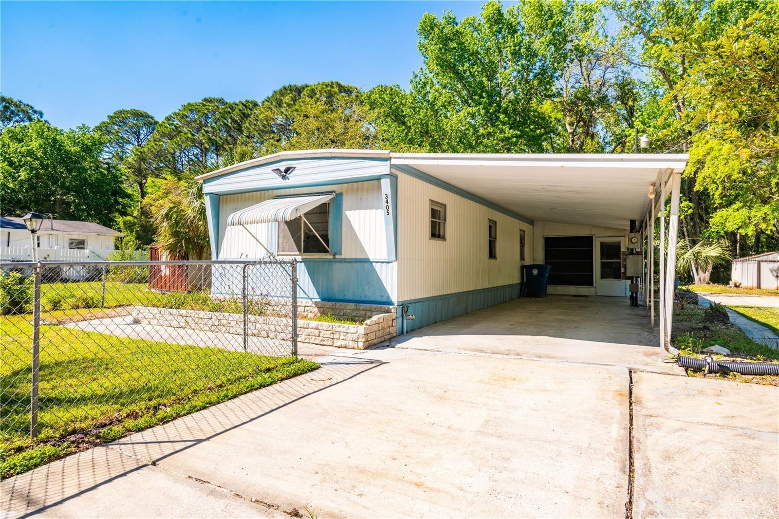 Located just minutes from Weeki Wachee, this charming 2-bedroom, 2-bath mobile home sits on across 2 adjoining parcels total of 0.36 with one parcel housing the septic system. Enjoy Florida living with an attached carport, detached shed, and backyard carport--perfect for extra storage or parking your boat.

You'll love the prime location: close to shopping and amenities, yet tucked away near nature with easy access to outdoor adventures like kayaking, fishing, and hiking. NO HOA means more freedom and flexibility--ideal for a weekend retreat or full-time residence, offering comfort, convenience, and coastal charm.

Don't miss this rare opportunity--schedule your showing today!