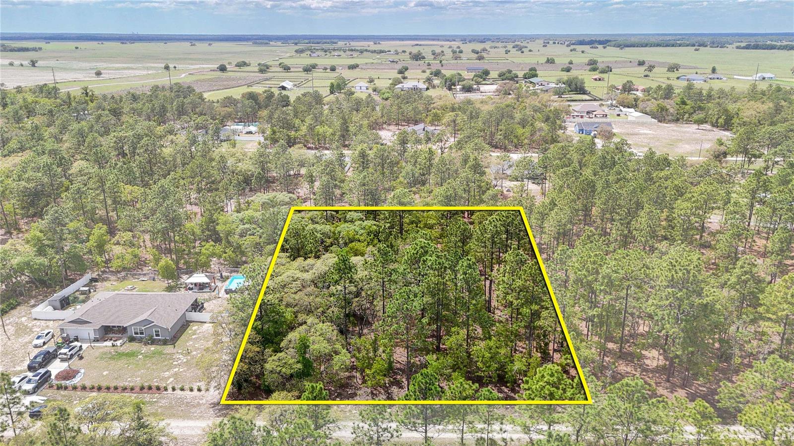 No mandatory HOA fees! Discover the perfect blank canvas for your dream home on this sprawling 1.16-acre lot in the tranquil Rolling Hills community. This high, dry, R-1 zoned parcel offers a peaceful countryside atmosphere surrounded by lush landscapes and newer homes. Enjoy the ultimate Nature Coast lifestyle with easy proximity to the world-famous Rainbow Springs State Park and the World Equestrian Center. Local dining favorites like Swampy’s and The Blue Gator are nearby, along with convenient access to regional shopping, everyday amenities, and top-tier medical facilities. The property is easily identifiable by the 4x4 wood stakes at the corners, located directly across from house #6990 and to the left of house #7015. Drive by today and start planning your custom retreat!