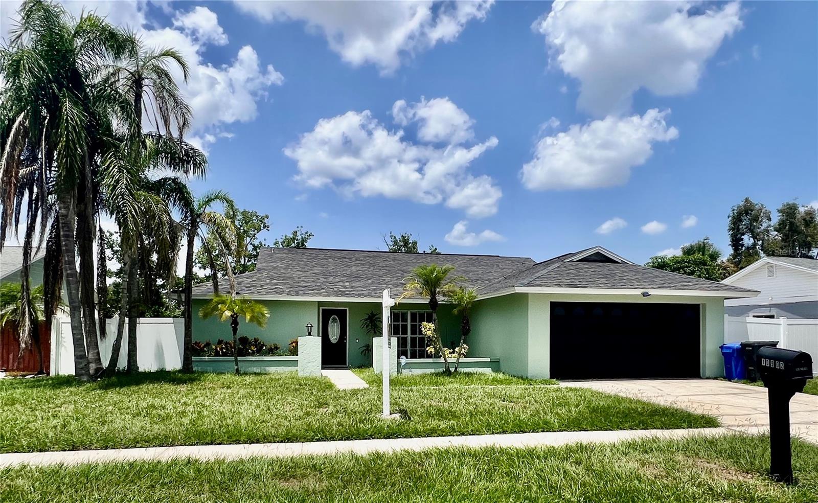 Welcome to this beautifully Move in Ready updated Home -3 bedroom, 2 bath with 2 cars garage & Private Heated Pool located in the desirable Plantation community, offering plenty of natural light, spacious living, and exceptional outdoor space with a beautiful Custom Lanai & Pool Screen Enclosures That Give You A Space You Can Enjoy All Year Round. Step inside to discover Title flooring throughout and open layout. The inviting living room and dining room features a high ceilings and two French doors. 
The kitchen is designed for both functionality and style, featuring stainless steel appliances, a convenient breakfast bar, and breakfast nook.  The spacious primary suite offers a private retreat with a beautifully updated bathroom showcasing sink and a walk-in shower, and a closet. Two additional bedrooms provide flexibility for family, guests, or a home office. Solar Pool Panels (2015),  Roof (2021),  Water Heater (2025),  HVAC System (2014).
Enjoy one of the community pools conveniently located at the end of the street approximately 5 minutes walking. Notable updates include new paint inside and outside the entire house (2026), professional primary bathroom remodel, professional guest bathroom remodel, new main door and framing (2026). Residents of Plantation enjoy access to a variety of community amenities, including a clubhouse, two pools, multiple playgrounds, tennis courts, basketball courts, racquetball courts, playgrounds, soccer fields, a dog park, scenic lakes, and walking paths, and additional recreational facilities, all within a well-established neighborhood Conveniently located near Veterans Expressway, Citrus Park Mall, shopping, dining, Tampa International Airport, Busch Gardens, downtown Tampa, Costco and Beaches.