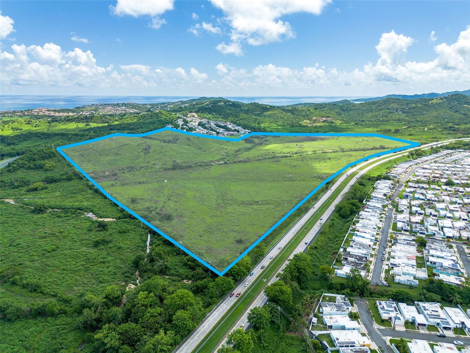 Located in the vibrant region of Humacao, PR, this prime 135-acre parcel offers an exceptional development opportunity. Positioned along PR-906 and near alongside PR-53, Parcela K is strategically situated just minutes from Palmas del Mar resort community. This proximity to Palmas del Mar enhances the property's appeal, providing future residents with easy access to world-class amenities including golf courses, marinas, beaches, and fine dining. Zoned for Residential Intermediate (R-I), this land is perfect for residential development.

Humacao is a thriving municipality on the island's eastern coast, known for its picturesque landscapes, beautiful beaches, and vibrant community. The region is well-connected by major highways, making it convenient for travel to and from San Juan and other key areas of Puerto Rico. Additionally, Humacao hosts a variety of local businesses, schools, and healthcare facilities, providing a well-rounded living environment for residents. The combination of natural beauty, luxury amenities, and practical conveniences makes Parcela K an attractive development opportunity in a highly sought-after area.