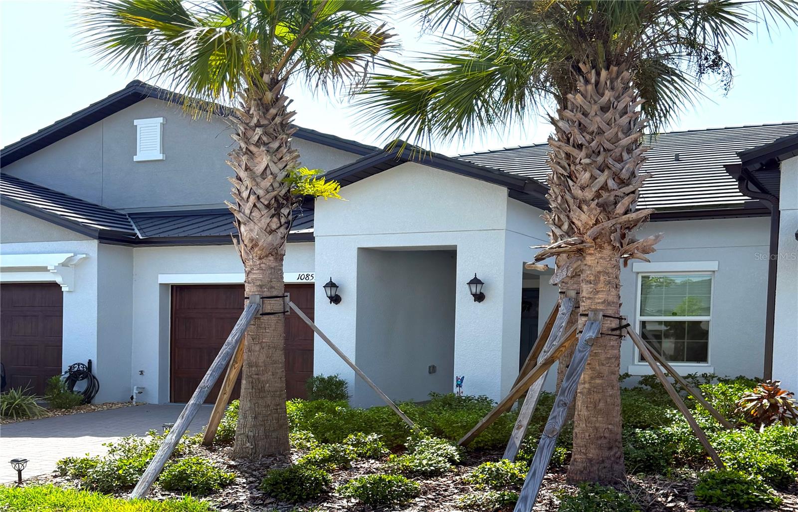 Clean move-In Ready low-maintenance home in the sought-after Angeline Active 55+ community in Land O Lakes, FL 34638! This open-concept 2-bedroom, 2-bathroom single-story villa (1,398 sq ft) in Pasco County offers an unbeatable value competitively priced with brand-new Angeline builds while delivering immediate move-in readiness in a proven flawless home with significant ownership advantages.
Nestled as an interior unit, enjoy enhances protection and lower electricity bills compared to end units, thanks to better temperature regulation and shared walls. Exterior maintenance is fully included in the HOA, helping keep your homeowners insurance low and freeing you from time-consuming yard work or exterior upkeep—so you can focus on enjoying the Florida golf and gulf lifestyle!
Step inside to a bright, modern kitchen featuring elegant bright Silestone quartz countertops, sleek stainless steel appliances, and plenty of workspace for casual meals or entertaining. An inside laundry room features top-grade washer and dryer included with the home, adding everyday convenience. The oversized single-car garage with overhead racking provides extra storage and parking flexibility for both cars and golf carts in this 55+ active adult haven.
Angeline is a vibrant, master-planned 6,200+ acre community designed for wellness and active living. Residents love the resort-style pool, state-of-the-art Medley Club clubhouse with fitness center, yoga studio, cafe/bar, game rooms, pickleball, bocce, shuffleboard, trails, community garden, wih more features on the horizon. The broader Angeline area boasts future amenities like a MetroLagoon, Pasco County park, extensive green spaces, and proximity to the Moffitt Cancer Center’s new 775-acre Speros FL campus—a major draw for those seeking world-class healthcare and research nearby. VA and other hospitals are also nearby.
Prime location with easy access buyers search for: Quick connectivity via the Suncoast Parkway (SR-589) puts you minutes from Tampa Bay commutes (approx. 30-45 minutes to downtown Tampa), US-41, and major employment/shopping hubs. Aviation enthusiasts appreciate proximity to local general aviation options, including fields near Masaryktown and Pilot Country Airport. Explore nearby attractions such as Cypress Creek Preserve, Lettuce Lake Regional Park, Wiregrass shopping, Gulf beaches, and more—all within a short drive. Sports enthusiasts are a short drive to Raymond James Stadium, home of the Tampa Bay Buccaneers, The Trop - Home of the Tampa Bay Rays, Amalie Arena - Home of the Tampa Bay Lightning, not to mention the many public golf courses, beaches, and attractions nearby.
Act now for exceptional value! With ongoing discussions around potential Florida homestead property tax relief or elimination gaining momentum, securing this home could position you perfectly for long-term savings and stability. Don't miss this rare opportunity to own in one of Pasco County's most desirable active adult communities before prices adjust or inventory shifts.
This home checks every box for comfort, convenience, and community. Schedule your private showing today—your low-maintenance dream awaits in New Angeline! Away from the hustle and bustle of the crowded city yet convenient access to everything the Greater Tampa Bay Area has to give.