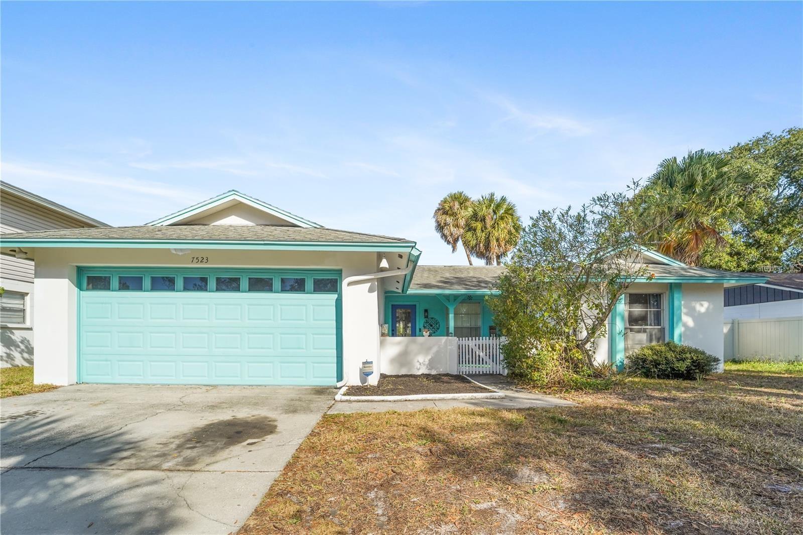 Thoughtfully updated and competitively positioned, this home presents a rare opportunity to enjoy private pool living in one of Tampa's most convenient locations.

Welcome to your own private retreat in Tampa. This move-in-ready pool home features beautifully renovated kitchen and bathrooms, updated cabinetry, countertops, and fixtures, a brand-new breakfast bar, oversized pantry, spacious laundry room, and flexible living spaces designed for today's lifestyle. The front bedroom with French doors offers the perfect space for a home office, guest suite, study, or creative retreat.
Step outside and discover where this home truly shines. Whether you're enjoying your morning coffee by the pool, hosting weekend gatherings with family and friends, or unwinding beneath the shade of mature trees, the fully fenced backyard creates a peaceful setting for year-round Florida living. The private pool, spacious patio area, newer vinyl privacy fencing, and storage shed make entertaining and everyday living effortless.

Beyond the front door, Tampa's best attractions are within easy reach. Catch a flight from Tampa International Airport in minutes, spend the afternoon golfing near Rocky Point, enjoy waterfront sunsets at Cypress Point Park, explore marine life at the Florida Aquarium, shop and dine at Citrus Park Town Center, or enjoy thrilling rides and entertainment at Busch Gardens. Whether your lifestyle includes travel, recreation, outdoor adventures, or simply enjoying everything Tampa has to enjoy, this location puts it all within reach while still providing the comfort of coming home to your own private oasis.

No flood insurance required. More than just a house, this is an opportunity to enjoy the Florida lifestyle you've been searching for.