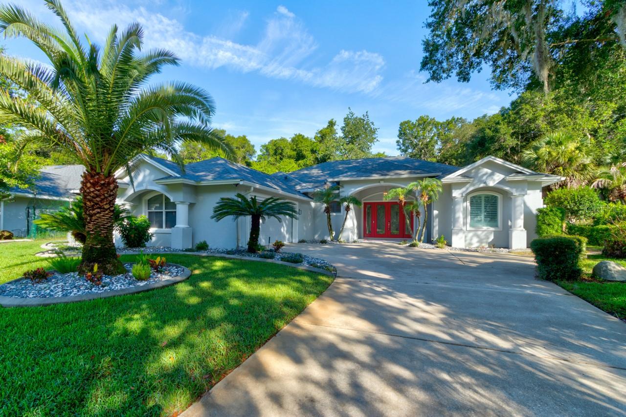 Virtually Staged. Welcome to this beautifully updated pool home in the highly sought-after Halifax Plantation community! Built in 1998, this 3-bedroom, 2.5-bath residence offers the perfect blend of comfort, style, and peace of mind with numerous recent upgrades. The thoughtfully designed floor plan includes a convenient pool bath with direct access to the lanai, making outdoor entertaining effortless.
Major improvements include a new HVAC system (2025), new water heater (2025), roof replaced in 2016, whole-house generator (2022), whole-house water filtration system, owned ADT security system, and a paid-in-full solar system installed in 2025, providing exceptional energy efficiency and significantly lower electric bills.
Inside, you'll find new porcelain tile flooring throughout (2025), elegant crown molding, plantation shutters, an electric fireplace, and new sliding glass doors that seamlessly connect the living area to the screened pool. The beautifully updated kitchen features quartz countertops and soft-close cabinetry and drawers.
Your private outdoor retreat includes a heated saltwater pool, resurfaced within the last five years, an updated paver pool deck, and a convenient garage screen enclosure.
Close to I95, Halifax Plantation amenities, including an 18-hole championship golf course, clubhouse, Junior Olympic-size community pool, tennis courts, state-of-the-art fitness center, restaurant, and sports bar. With quality updates already completed and resort-style amenities just moments away, this move-in-ready home is ready for you to enjoy the very best of Florida living!