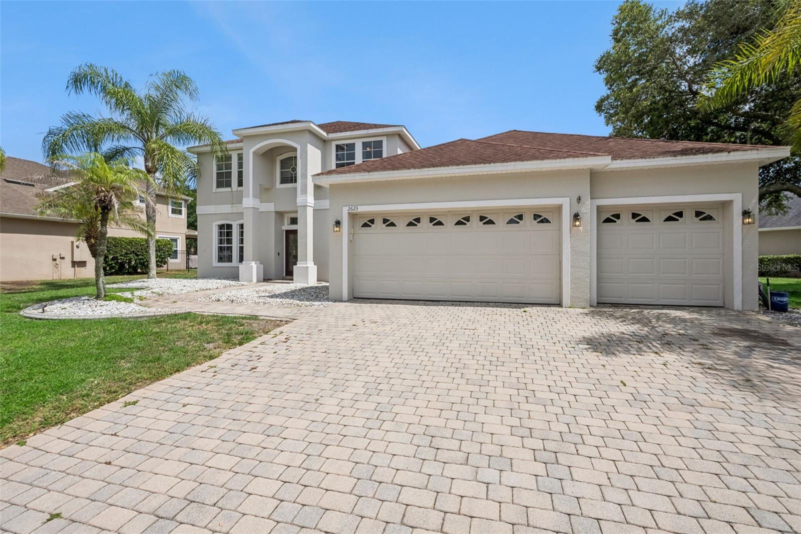 Virtually Staged. A private pool and spa, 5 bedrooms, a first-floor primary bedroom, recent major upgrades, and room for everyone, all tucked inside one of Oviedo's most sought-after resort-style communities. Welcome to Live Oak Reserve, where space, comfort, and community come together in one exceptional home. This beautifully maintained 5-bedroom, 3-bathroom pool home offers a versatile two-story floor plan designed for the way families live today. Step inside and you'll immediately appreciate the flexibility of the layout. A formal dining room provides the perfect setting for hosting holidays and special occasions, while the open flex space can easily serve as a home office, formal living room, playroom, or study. At the center of the home, the spacious great room brings everyone together with a seamless flow between the living room, dinette, and kitchen, all overlooking the screened pool and spa. The centrally located kitchen is both functional and stylish, featuring stainless steel appliances, distinctive cabinetry, a breakfast bar, and ample counter space for meal preparation and entertaining. Large windows and sliding glass doors fill the home with natural light and create an effortless connection between indoor and outdoor living. One of the home's most desirable features is its thoughtful split-bedroom floor plan. The spacious primary suite is conveniently located on the first floor, offering privacy and comfort with an ensuite bathroom and peaceful views of the backyard. A second first-floor bedroom and full bathroom are situated on the opposite side of the home, making it ideal for guests, multigenerational living, or a private office. Upstairs, you'll find three additional bedrooms and a versatile loft that can easily function as a media room, game room, study area, or second living space. Step outside and discover your own private Florida retreat. The generously sized covered lanai overlooks a screened pool and spa, creating the perfect setting for weekend barbecues, entertaining friends, or simply relaxing after a long day. This home has been thoughtfully updated with major improvements already completed, including both HVAC systems replaced within the last year, all flooring updated in 2021, kitchen appliances replaced in 2021, interior and exterior paint completed in 2022. Residents of Live Oak Reserve enjoy access to an impressive collection of resort-style amenities, including baseball and soccer fields, basketball, tennis and volleyball courts, a clubhouse, fitness center, community pool with tube slide, splash pad, multiple playgrounds, walking trails, and beautiful conservation areas. Located in desirable Oviedo, Florida, and zoned for top-rated Seminole County schools, this home offers convenient access to Oviedo on the Park, the University of Central Florida, Research Park, shopping, dining, major employers, and major highways connecting you to the greater Orlando area. If you've been searching for a move-in ready pool home in Oviedo that offers space, flexibility, updates, and an incredible community lifestyle, you've just found it.