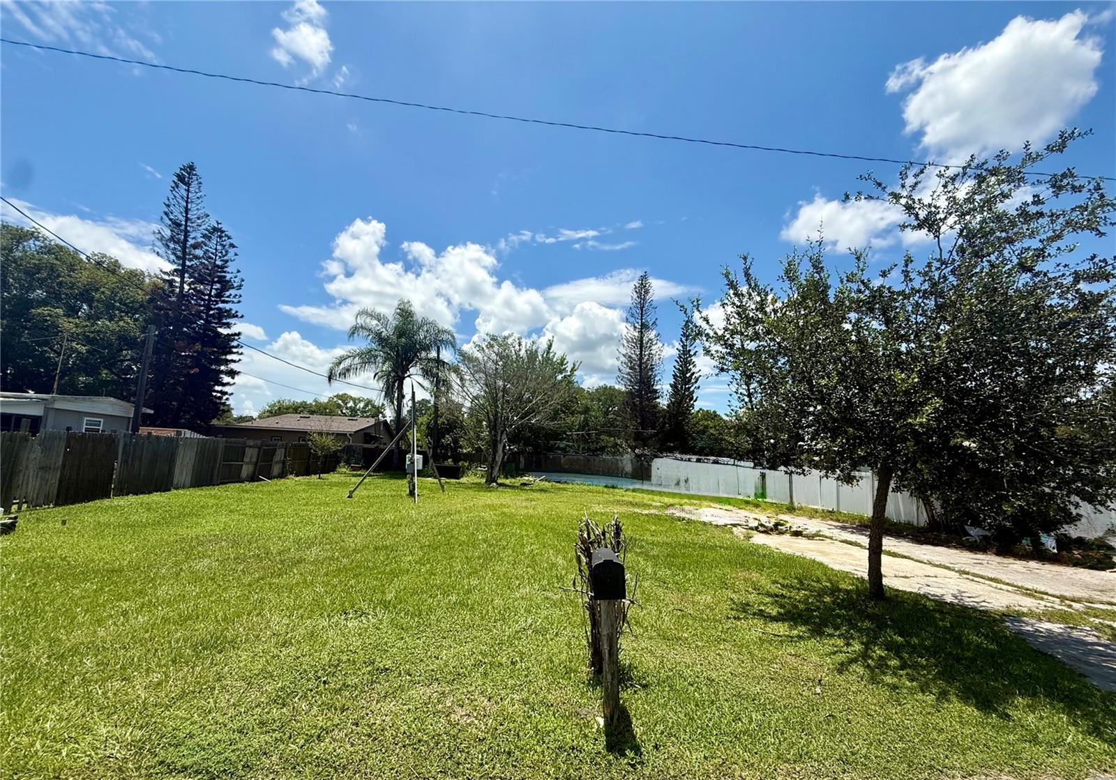 0.15 Acres of Cleared Vacant Land – Ready to Build!

Don't miss this fantastic opportunity to own 0.15 acres of cleared residential land that's ready for your new construction home or manufactured home! This residentially zoned property already has power, a septic system installed in 2016, and a private well installed in 2020, saving you time and money as you prepare to build.

An added bonus is a $27,777 credit toward impact fees, offering significant savings for your future construction project. The property also has no HOA and no CDD fees, giving you greater flexibility and fewer ongoing expenses.

Enjoy the perfect balance of peaceful living and convenient access to recreation and everyday amenities. Located less than one mile from the Trout Lake Public Boat Ramp, you'll have easy access to Trout Lake and the Alligator Chain of Lakes, making it ideal for boating, fishing, and other outdoor activities.

Conveniently situated near shopping, medical facilities, restaurants, and more, this property is also less than an hour from Florida's beautiful beaches. Whether you're looking to build your dream home, place a manufactured home, or invest in a growing area, this property offers outstanding value with existing improvements, substantial impact fee savings, and an unbeatable location.