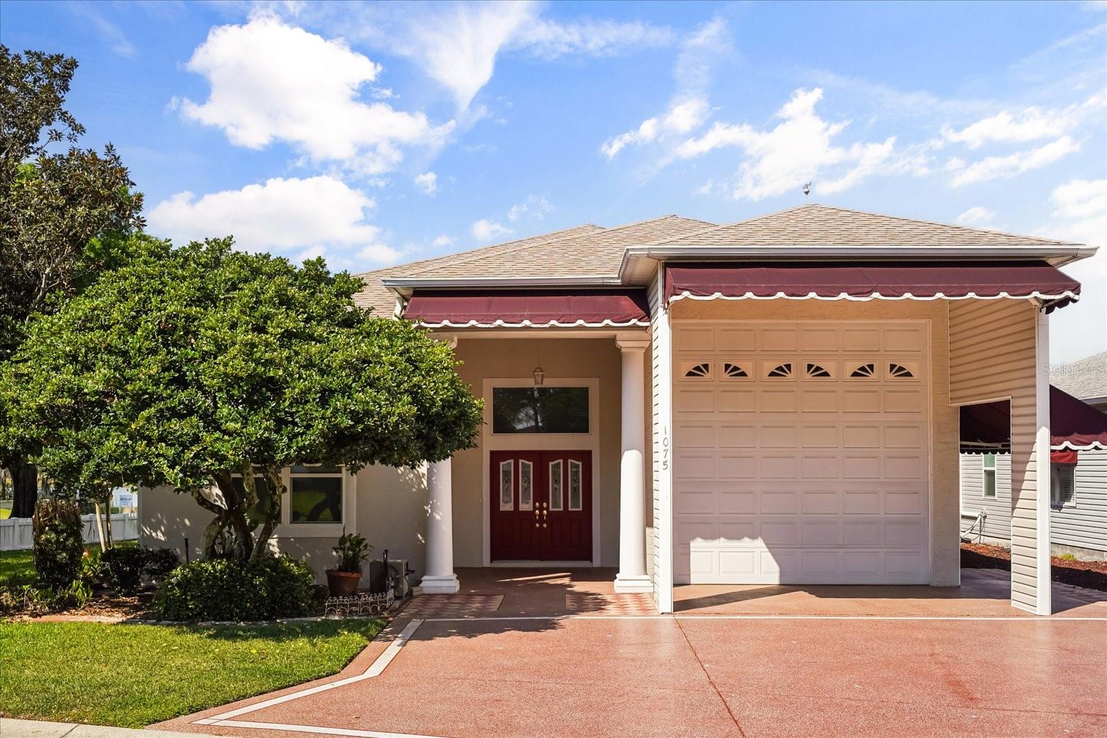 One or more photo(s) has been virtually staged. Welcome to this charming home in the desirable 55+ gated community of Mount Olive Shores North, where the lifestyle is as relaxed and fulfilling as the setting itself. This property is not only a place to call home but a sanctuary that caters to the motor coach enthusiast, offering a spacious garage designed with the motorist in mind. With water hookups, a waste disposal connection, and a 14-foot tall garage door, this garage can easily accommodate a 45-foot motor coach. The two high-powered fans ensure that your motor coach stays cool and comfortable after a long drive, while the soaring garage ceilings offer additional flexibility, perfect for the addition of lifts to store one or two collector cars.

This home offers a peaceful and welcoming atmosphere, with a community that embraces an active, resort-style lifestyle. Whether you're taking a morning walk by the lake or joining in on one of the many social activities, you'll quickly appreciate the balance of tranquility and opportunity for connection. The home’s floor plan is designed with comfort in mind, and the owner is offering a flooring credit to make it truly your own.

Additionally, the owner has the lot across the street available for sale, providing even more space and potential for those seeking extra room to enjoy this wonderful area. With its blend of practical features and serene living, this home is perfect for those looking for a balanced lifestyle and a community that truly feels like home.

Don’t miss out on the opportunity to make this unique property yours. Reach out today to schedule a private showing and experience the charm of this inviting home.