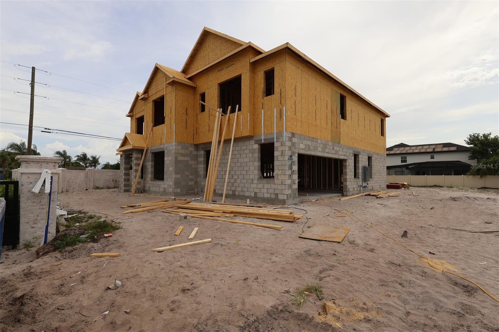 Under Construction. Welcome to 2568 Hawks Overlook Place in Oviedo, FL: a stunning new construction home built by M/I Homes. This 2-story home offers 4,673 square feet of thoughtfully designed living space, featuring 5 bedrooms, 4 full bathrooms, and 1 half bathroom.
 
Step inside to discover an open-concept living space that creates a seamless flow between gathering areas, perfect for both everyday living and entertaining. The quality of design is evident throughout, with carefully selected finishes and attention to detail in every room.
 
Other highlights include a first-floor guest suite, a formal dining room, a versatile den, a huge loft, a media room, and owner's bedroom with a spa-like en-suite bathroom and walk-in closet, a covered lanai, and an oversized 2-car garage

The owner's bedroom features a generous en-suite bathroom, providing a private retreat within the home. The lanai extends the living space outdoors, offering a covered area to enjoy the Florida climate year-round.
 
Situated in a welcoming neighborhood with convenient proximity to parks, this home provides an ideal setting for an active lifestyle. The quality of design from M/I Homes ensures lasting value and everyday comfort in this move-in ready home.