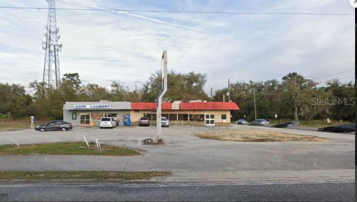 Seller is looking to combine this parcel with another parcel which is right behind this property. 
Laundromat is currently leased to long term tenant. "Zoning: C-C"

Seller is willing to share plans for a new strip center that was to be build next to this one. Survey is also available.Pin Location: Latitude 28.69510024, Longitude -81.50894719

Note: buyers I emphasize the importance of conducting thorough due diligence to ensure that the property meets your expectations and requirements.