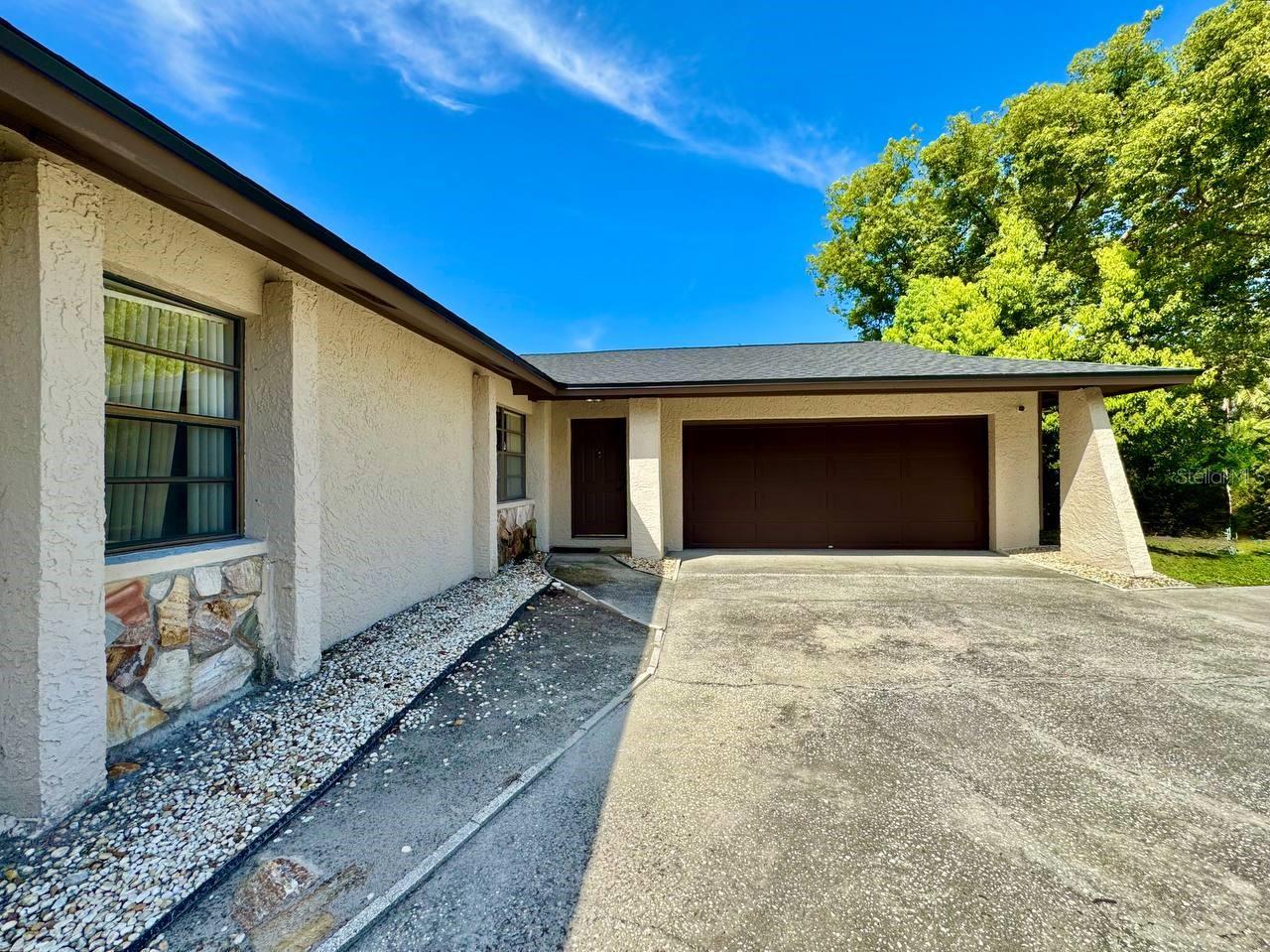 Welcome to this beautifully maintained 3-bedroom, 2-bath home in Clearwater, featuring a 2-car garage and an expansive fenced-in backyard perfect for entertaining, relaxing, or enjoying time with family and pets. Step inside to an open and airy floorplan with wood laminate flooring in the main living areas and plush carpeting. Ceiling fans throughout the home provide added comfort year-round. The chef's kitchen is a dream, complete with stainless steel and white appliances and plenty of space for cooking and gathering. Glass sliders open from the living area to a screened-in patio, offering a perfect spot to enjoy your morning coffee or unwind in the evening while taking in the peaceful outdoor setting. The massive backyard provides endless possibilities for entertaining, gardening, or adding future features like a pool or play area. The spacious primary bedroom features a private en-suite bathroom with a large walk-in shower, an extended vanity with ample counter space, and a generous walk-in closet. Two additional bedrooms offer flexibility for guests, home office space, or a growing family. Located in a convenient Clearwater neighborhood, you're just minutes from shopping, restaurants, parks, and major roadways. This home combines comfort, space, and functionality don't miss your chance to make it yours! In addition to the advertised base rent, all residents are enrolled in the Resident Benefits Package (RBP) for $50.00/month which includes HVAC air filter delivery, credit building to help boost your credit score with timely rent payments, utility concierge service making utility connection a breeze during your move-in, and much more! More details upon application. Pets welcome! No HOA! Occupied and will be available as soon as 08/13/2026!