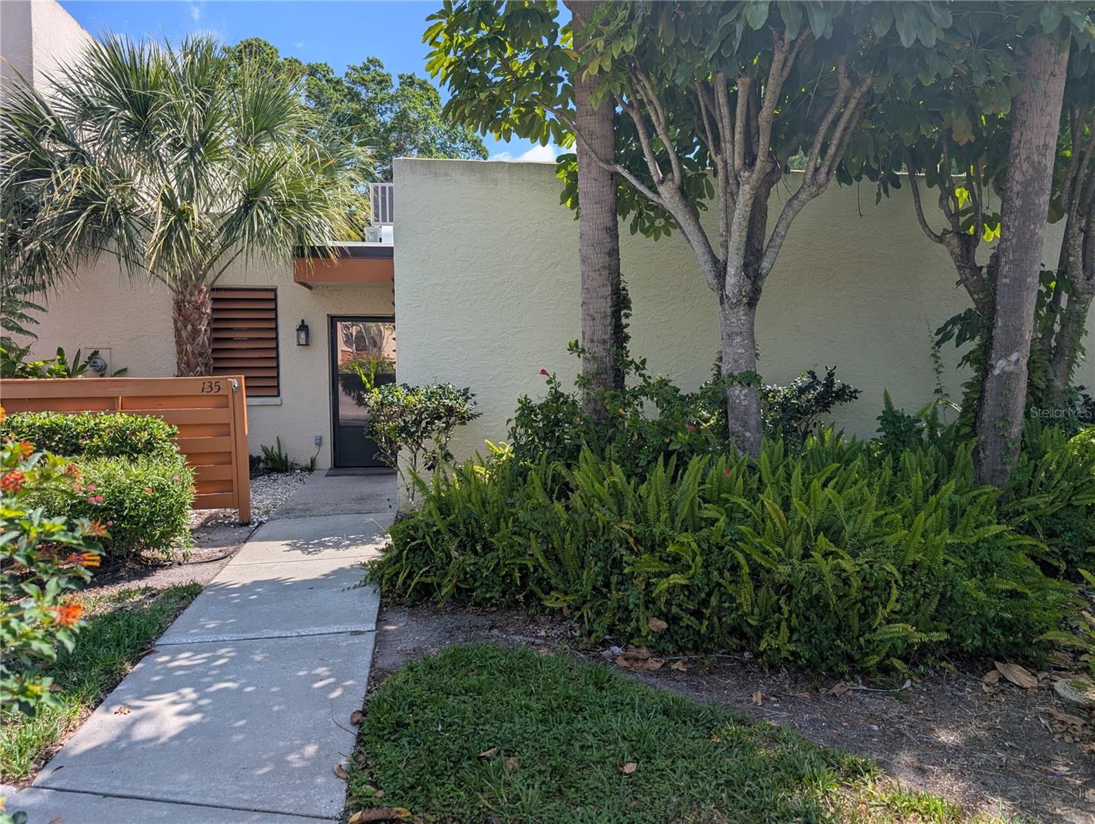 Discover comfort, privacy, and natural beauty in this updated 3-bedroom, 2-bath villa located in the highly desirable Wildwood Springs community. With no neighbors above, this residence offers a quiet, private living experience. The flexible third bedroom is perfect as a home office, den, or guest space to suit your needs.

Inside, you’ll find brand-new luxury vinyl plank flooring throughout, along with updated fixtures and beautifully renovated bathroom vanities. The kitchen has been opened up by removing the drop-down ceiling, creating a brighter, more spacious feel along with newer appliances.

Step out back to a generously sized lanai—an ideal space for relaxing or entertaining while enjoying the peaceful setting and mature landscaping that provides both shade and privacy.

Wildwood Springs is a thoughtfully cared-for community set around an 88-acre Audubon-designated bird and wildlife sanctuary. As you explore the neighborhood, you’re surrounded by towering live oaks, graceful palms, and tranquil lakes that reflect the charm of classic Old Florida. Residents have access to a variety of amenities, including tennis and pickleball courts, heated pools and spas, plus scenic walking and biking paths woven throughout the community.

Enjoy low-maintenance living with condo fees that cover water, sewer, trash, internet, cable, exterior maintenance and insurance, as well as pest control. Covered parking is also included, and with so much taken care of, the only additional utility expense is electric—making budgeting simple and stress-free.

Conveniently located in the heart of Bradenton, you’re just minutes from dining, shopping, schools, and entertainment—and only 15 minutes from the world-renowned beaches of Anna Maria Island and the stunning Gulf Coast.