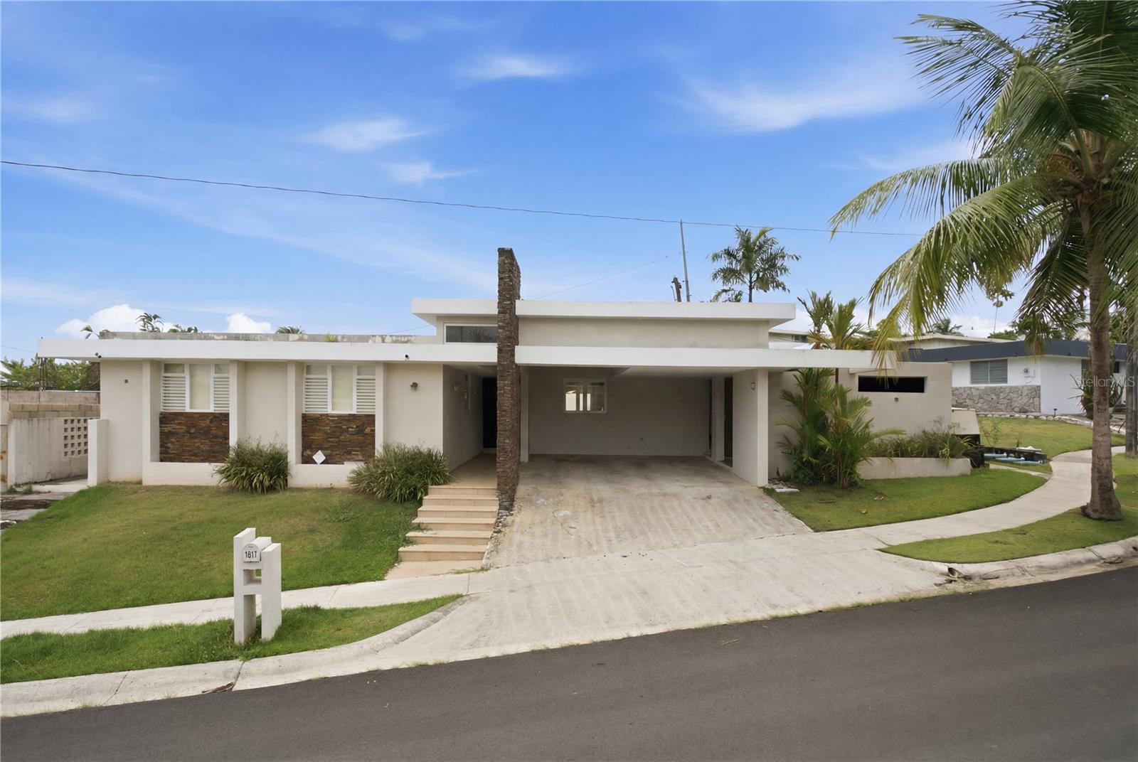 Short Sale. Experience luxury living in one of Guaynabo’s most sought-after neighborhoods. This exceptional residence offers generous interior space, refined finishes, and a layout designed for comfort and versatility. The home features 4 bedrooms, a bonus room, 4 full bathrooms, an expansive 4+ car garage, and a beautiful swimming pool ideal for entertaining. With a full power generator and approximately 2,700 sq. ft. of construction, this property delivers the convenience and lifestyle today’s buyers demand. Offered at $1,500,000.