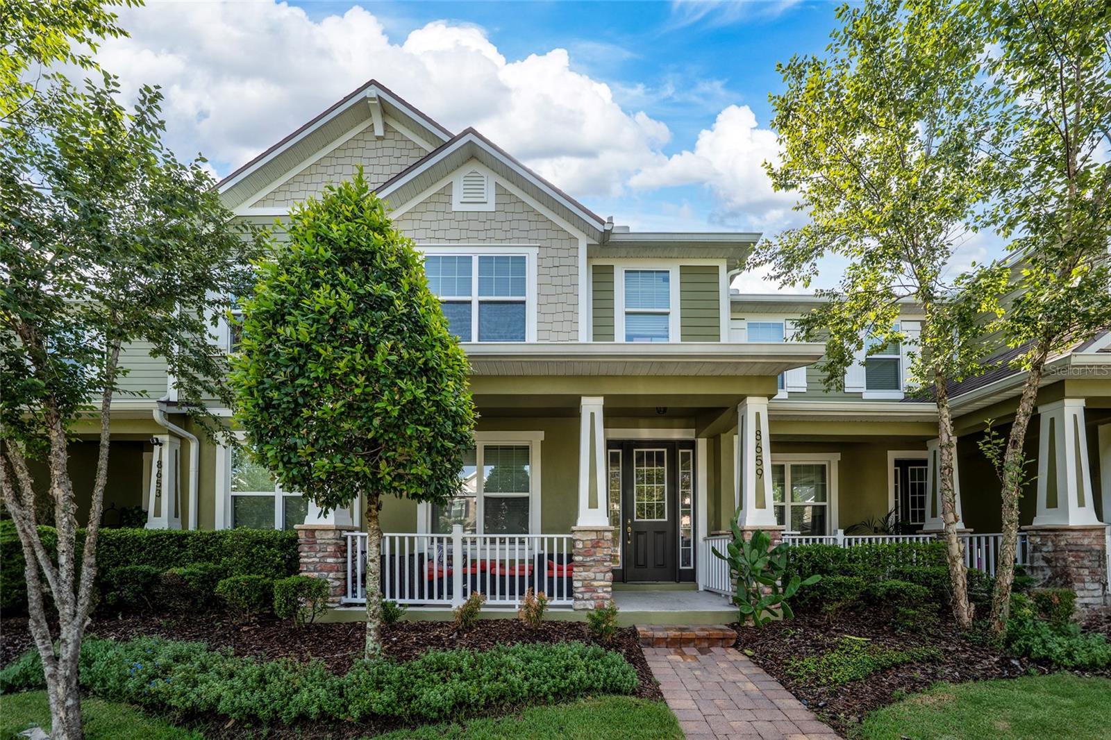 Located in the prestigious Randal Park community, this stunning 3-bedroom, 2.5-bath townhouse with a versatile flex room offers modern comfort, exceptional amenities, and an unbeatable location near Lake Nona. Thoughtfully designed for modern living, this home showcases a bright and spacious open-concept floor plan filled with abundant natural light. The gourmet kitchen features granite countertops, stainless steel appliances, ample cabinetry, and generous counter space, seamlessly connecting to the expansive living and dining areas—ideal for both everyday living and effortless entertaining. Step outside to a covered paver patio overlooking tranquil conservation views, providing the perfect setting to relax and enjoy Florida's natural beauty. Residents of Randal Park enjoy an exceptional lifestyle with resort-style amenities, including a community pool, fitness center, playgrounds, dog parks, and miles of scenic walking and biking trails. Ideally situated near Lake Nona's Medical City, Orlando International Airport, Downtown Orlando, SR 417, SR 528, premier shopping, dining, and Central Florida's world-famous attractions, this home is also zoned for highly regarded Innovation High School. Offering an outstanding combination of elegance, functionality, and an unbeatable location, this is an exceptional opportunity to own a home in one of Orlando's most desirable communities.