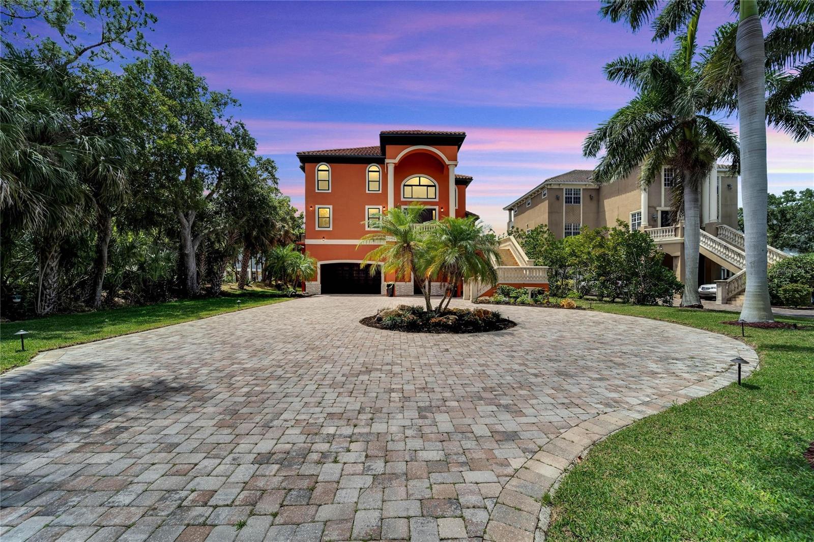Under contract-accepting backup offers. Welcome to your dream Florida lifestyle! This stunning LUXURY home offers a breathtaking view of Sarasota Bay, where you can watch manatees and dolphins play right from your private balcony. With 4 spacious bedrooms, including a grand master suite with a spa-like ensuite bathroom and walk-in closet, this home delivers on luxury and comfort. The second bedroom also has a private bathroom and walk-in closet, while the 3rd and 4th bedrooms share a Jack-and-Jill style bathroom.

The open floor plan of the main floor is perfect for entertaining guests. The chef's kitchen boasts Subzero and Wolf appliances, and there's a breakfast/informal dinette that opens up to the large family room. You'll also find a formal dining room, powder room, office, study/gym room, and formal living room, all with stunning views of Sarasota Bay.

This meticulously maintained home comes with lifetime warranties on all Kohler plumbing fixtures, a 4-year-old HVAC, and an 11-year-old tile roof. The gorgeous landscaping surrounds a fenced-in saltwater pool with a sunbathing deck and spa. The property also leads to your private dock and lift for your boat, where you can fully appreciate the unobstructed views of Sarasota Bay.

This home is also designed with convenience in mind, featuring an elevator that takes you from the garage all the way up to your master suite. Located just 5 minutes from Sarasota Airport and 5 miles from downtown Bradenton and Sarasota, this property offers easy access to everything you need.

If you're a sports enthusiast, you'll be happy to know that IMG Academy, the world’s leading sports education brand, is located nearby. And if you love walking, riding your golf cart, or walking your dog in a safe area, this place has it all! With all of these amazing features, this home truly embodies the ultimate work-play-vacation lifestyle. Come see for yourself and make this your forever home!