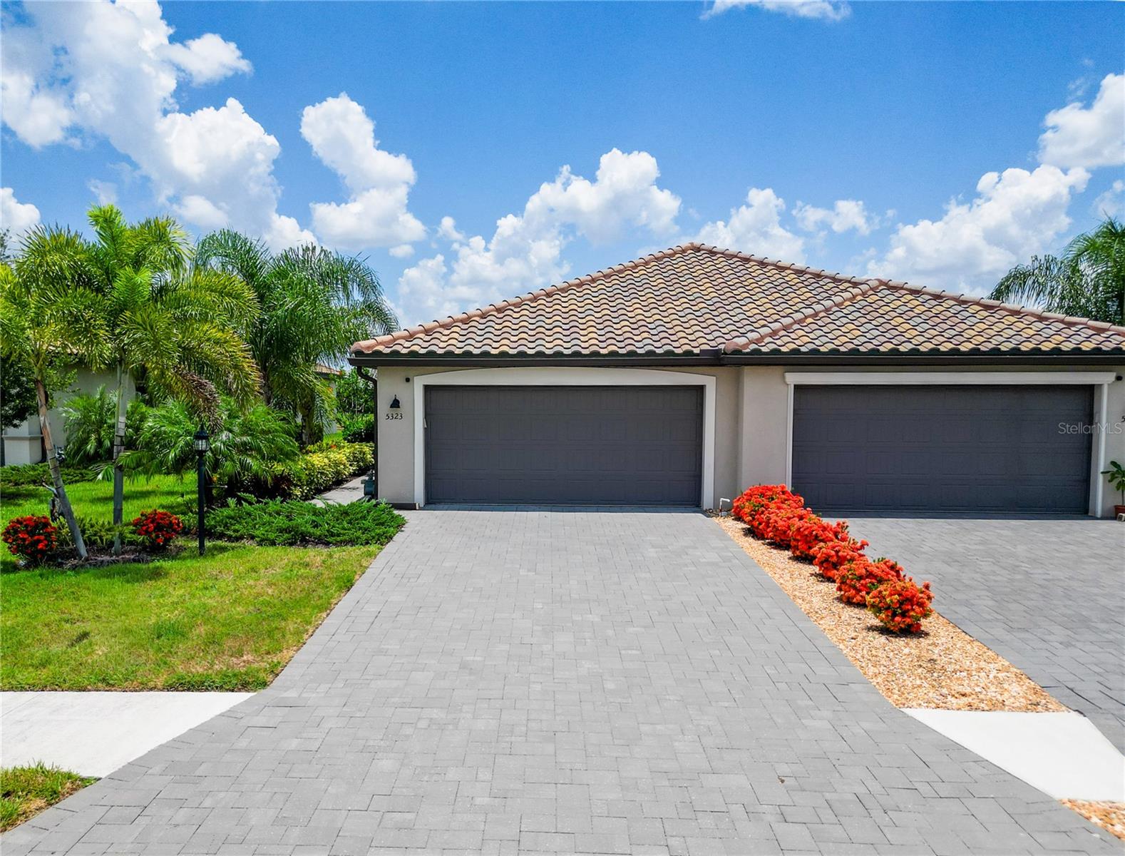 Welcome to this beautifully upgraded 2022-built villa located in the highly sought-after gated community of Lorraine Lakes in Lakewood Ranch! This spacious 2-bedroom, 2-bath residence offers 1,557 SF of thoughtfully designed living space with an open-concept floor plan, high ceilings, and abundant natural light throughout.

Recent upgrades and improvements include crown molding throughout the villa, a complete interior painting refresh, water softener system, upgraded yard fencing, extended lanai area for enhanced outdoor living, and custom garage shelving for additional storage and organization.

The kitchen opens seamlessly to the main living and dining areas, creating the perfect space for entertaining or relaxing. The primary suite features a spacious walk-in closet and private bath, while the split-bedroom layout provides privacy for guests or a home office setup.

Enjoy Florida living year-round from the extended screened lanai overlooking a peaceful pond view at the rear of the home - the perfect setting for morning coffee, relaxing evenings, or entertaining guests outdoors. Additional highlights include an attached 2-car garage, concrete tile roof, masonry construction, and low-maintenance living.

Located within the amenity-rich Lorraine Lakes community, residents enjoy resort-style pools, clubhouse, fitness center, tennis courts, pickleball, walking trails, and more. Conveniently situated near top-rated schools, shopping, dining, golf, UTC Mall, I-75, and the Gulf Coast beaches.

Move-in ready and ideally located in one of Lakewood Ranch's fastest-growing communities!