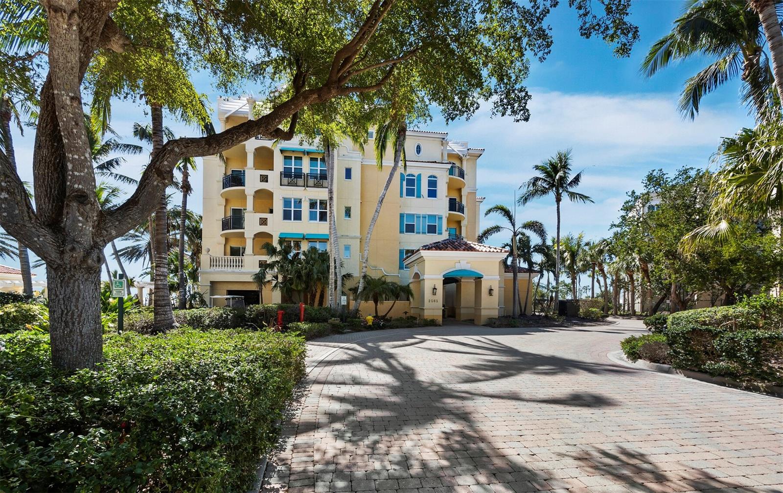 Under contract-accepting backup offers. Experience beachfront luxury in this spacious 3,800-square-foot 3-bedroom, 3.5-bath + den/office residence in the prestigious En Provence community on Longboat Key. A private elevator opens to a grand foyer with marble floors and tray ceilings. Expansive glass sliders in the living room frame stunning Gulf views and lead to an oversized terrace, perfect for seamless indoor-outdoor living. The expansive terrace is ideal for entertaining, featuring a built-in gas grill and outdoor cooking space overlooking the beach and lush grounds. The kitchen is both stylish and functional, featuring a center island, white cabinetry, and pristine white stone countertops. High-end appliances, including a natural gas cooktop, enhance the space, while a bold blue tile backsplash adds a striking contrast. The adjacent eat-in area, with Gulf views and a built-in desk, enhances both charm and practicality. The primary suite offers terrace access and a spa-like bath with a soaking tub, dual vanities, a makeup area, and a glass-enclosed shower. Two guest suites each include en-suite baths and scenic views. A large office provides flexibility and could easily convert into a fourth bedroom. Additional features include an in-residence laundry room and 2 car garage. Set on nearly six acres of pristine beachfront, En Provence blends elegance and convenience with a clubhouse, resort-style pool and spa, fitness center, and 24-hour guard gate. For those seeking additional amenities, optional membership to the nearby Longboat Key Club provides access to world-class golf, tennis, dining, a marina, and a spa.