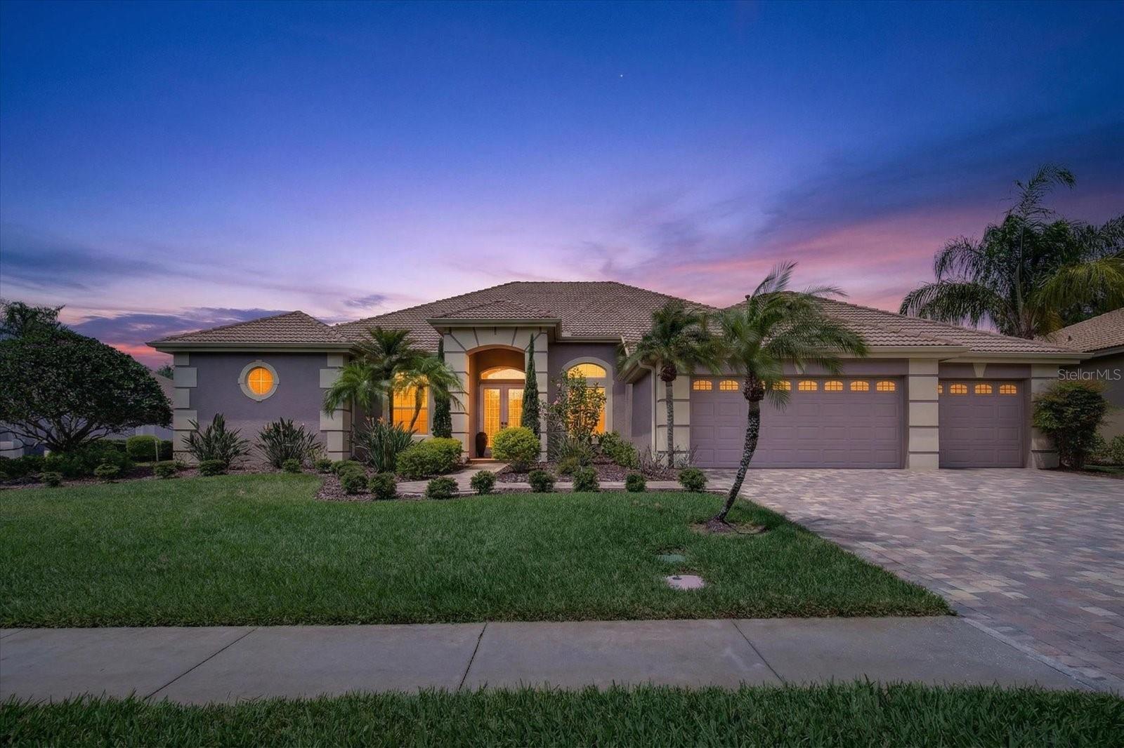 Virtually Staged. Welcome to Luxury Living in the Heart of Palm Harbor at 4052 Capitol Drive!
Experience resort-style living in the prestigious President’s Landing community — Lansbrook’s only gated enclave with private waterfront park, marina, and boat ramp.  This stunning home boasts nearly 3,700 sq. ft. of luxurious living space with a 3-way split floor plan. The primary suite features an ensuite and attached office, while all 3 other bedrooms include their own en suite bathroom as well. Flex area is approximately 435 sq. ft. addition creates the perfect In-Law Suite /Entertainment Room or guest retreat, complete with a large bonus/living area, bedroom, bathroom, 2 sets of sliding glass doors to the lanai, mini fridge, and bar area.
This home offers an open-concept living and dining area with high ceilings, abundant natural light, crown molding, French doors, a cozy fireplace, hardwood and porcelain tile floors. The gourmet kitchen features a kitchen island with a cooktop, newer stainless steel appliances, trash compactor, Bosch dishwasher, wine fridge, Butler’s pantry, breakfast bar, trash compactor and two separate dining areas that provide flexible entertaining options.
This is a perfect entertaining home with an oversized 50x50 lanai with brick pavers, pool and spa, full outdoor kitchen (including a grill, fridge, side burners, rotisserie, ice bin, and sink). All surrounded by lush green tropical landscaping, this resort-style backyard offers total privacy and the perfect setting for relaxation or gathers. 
Recent updates include: Generac Generator (2025), Newer Roof (2023), A/C Systems (2025/2021), Entire House replumbed, water softener, and water heater (2020).
President’s Landing residents enjoy exclusive amenities including a private waterfront park, boat ramp, and marina. The marina is for President’s Landing residents only — to lease a slip is less than $100 a month. This exclusive waterfront-adjacent neighborhood offers the ultimate in privacy and convenience in one of Palm Harbor’s most sought-after areas. it also provides access to Lansbrook’s extensive amenities: 2,500-acre Lake Tarpon with additional day docks and boat ramp, multiple parks, 5 miles of shaded tree-lined sidewalks, playgrounds, basketball and pickleball courts, soccer fields, top-rated schools, a popular YMCA, and golf course nearby.
Just 20 min to the beach, 25 min to Tampa International Airport, and 25 min to Downtown St. Pete, this home provides the perfect blend of luxury, privacy, and location. No flood or wind damage from previous hurricanes.
Move-in ready! This rare gem in a premier gated community won’t last long. Schedule your private showing today!