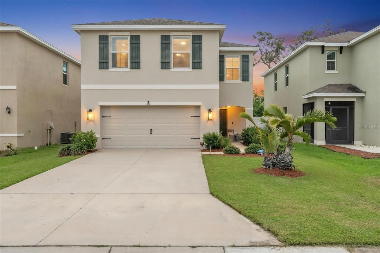 Welcome home to this stunning Florida oasis! The highly favored Aisle floor plan has everything you want and in the most beautiful aesthetic, boasting tastefully updated design features like trending painted cabinetry, permanent outdoor lighting, updated appliances, luxury vinyl plank flooring, shiplap and wainscoting accent walls, antique chandeliers, and designer outlet covers. The downstairs living area has luxury vinyl and is an inviting open concept that showcases a half bath and kitchen with tons of storage. The downstairs, stairway and loft, along with the primary suite have luxury vinyl as well, and the remaining bedrooms are carpeted. For privacy and convenience, this floor plan has the bedrooms as well as the laundry room upstairs. The construction for this home is solid block (even on the second story!!) with a new roof in 2025 that truly gives a huge sense of security during the Florida rainy seasons.  It has been pre-inspected and every minute detail has been addressed, making this property truly turn-key. The back yard is fenced and has a solid block back wall to aid in noise reduction and added privacy. The commute to anywhere from Manatee County to Sarasota or Hillsborough is a breeze with access to interstates I75 and I275 less than a 10 min drive. There's plenty of shopping and restaurants in the area, and the neighborhood often has food trucks and holiday gatherings by the (heated) pool cabana. It's truly a Florida paradise ready for the next person to love. Come see the attention to detail and what makes this home truly special!