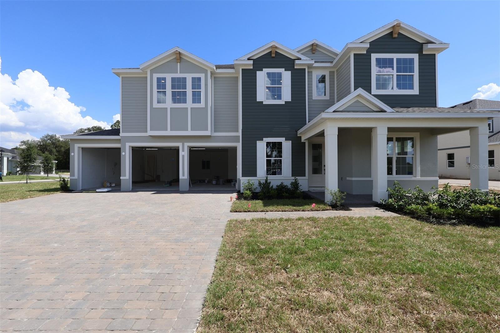 Under Construction. If you're searching for a spacious, single-story home that offers 5 bedrooms, 4 baths, and a 4-car garage, 3539 Wolves Creek Place in Apopka, FL is your perfect match! With 4,728 square feet of thoughtfully designed living space, this plan combines privacy, comfort, and versatility for today's modern lifestyle.

Step inside and be welcomed by a formal dining room and a private den, ideal for hosting elegant dinners or creating a quiet home office. At the heart of the home, the open-concept kitchen shines with a large island and an inviting eat-in nook, all overlooking the impressive 20' x 21' family room—perfect for entertaining or relaxing with loved ones.

A first-floor guest suite just off the family room makes multi-generational living effortless. Oversized windows and 8-foot pocket sliding doors flood the home with natural light and create a seamless connection to the outdoors, where you can enjoy your lanai in style.

Upstairs, discover a loft retreat surrounded by secondary bedrooms and the luxurious owner's suite, featuring a spacious walk-in closet, dual vanities, linen storage, a separate shower and a soaking tub for a spa-like experience.

Contact us today to learn more!