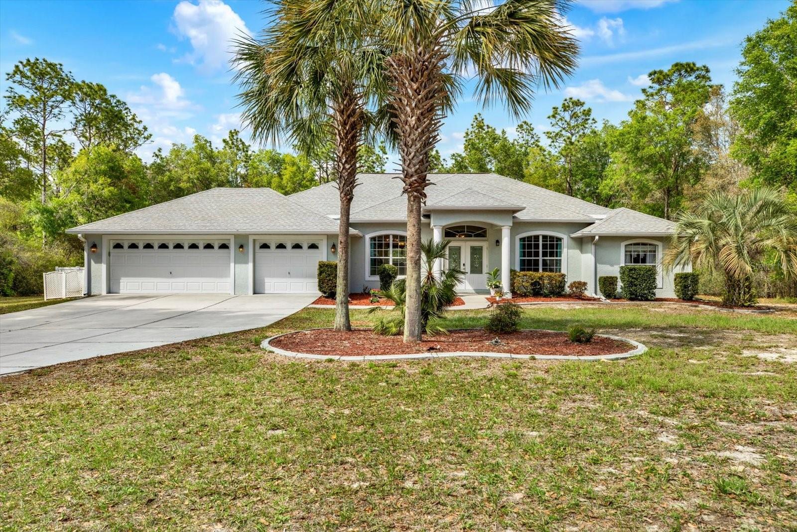 Well-maintained, single-owner home situated on 1.15 acres with NO rear neighbors, offering a combination of space, updates, and functional design in a convenient Citrus County location.

This 4-bedroom, 3-bath home features over 2,500 sq ft with a one-story layout, high ceilings, an open floor plan, and a split-bedroom design for added privacy. The main living area includes a kitchen/family room combo, ideal for everyday use and entertaining.
The primary suite includes a walk-in closet and en-suite bath, while the additional bedrooms and bathrooms are well-positioned for flexibility. Interior features also include ceiling fans, tile and luxury vinyl flooring, and an interior laundry area with washer and dryer included.

Recent updates include new flooring (2016), roof (2024), and HVAC system (2024).

The exterior offers multiple usable spaces, including a heated pool (2018), covered front and rear porches, and additional patio areas. The lot is over an acre with a paved driveway, oversized garage, and designated space for boat or RV parking. Additional features include rain gutters, a fire pit area, and a private yard.

Located near Crystal River, Rainbow Springs State Park, the Withlacoochee River, and the Withlacoochee State Trail, with access to outdoor activities such as boating, kayaking, biking, and walking trails. Also conveniently located near Inverness, Lecanto (with new shopping and dining), Homosassa, Ocala and Gainesville.

Low HOA and no required lease restrictions.