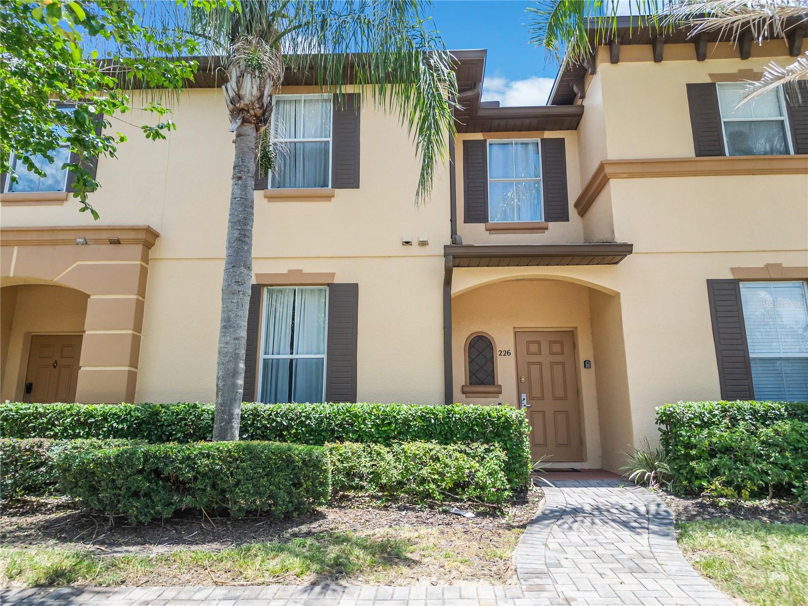 Experience the perfect blend of comfort, convenience, and flexibility in this fully furnished 4-bedroom, 3-bathroom townhome located within the gated Regal Palms Resort community. Designed for easy living, the spacious floor plan offers ample room for family gatherings, entertaining guests, or enjoying a relaxing Florida getaway. The well-equipped kitchen opens to the living and dining areas, creating an inviting atmosphere throughout. Step outside to your private patio and enjoy Florida's year-round sunshine. Ideally situated just minutes from shopping, restaurants, golf, major roadways, and Central Florida's premier attractions. Residents and guests enjoy access to exceptional resort amenities, including a pool, lazy river, fitness center, clubhouse, playground, and on-site dining. Whether you're looking for a full-time residence, seasonal retreat, or an investment opportunity, this property offers endless possibilities.