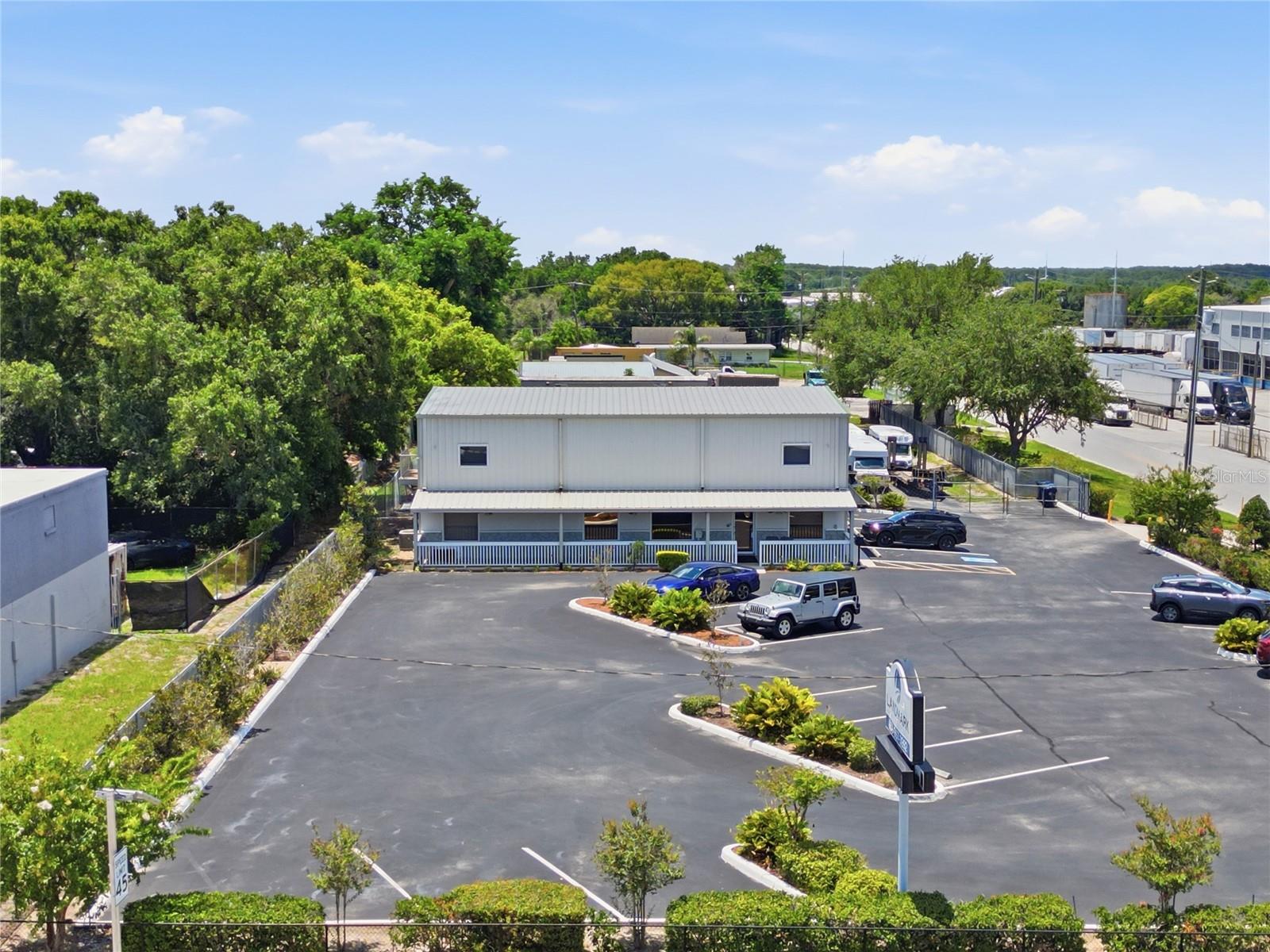 Prime commercial opportunity in the heart of Auburndale! Situated on approximately 1.84 acres across two parcels, this impressive property features 6,822 square feet of professional office space with exceptional flexibility for a variety of business operations. The well-maintained two-story office building offers numerous private offices, conference rooms, meeting spaces, reception areas, break rooms, ADA-compliant restrooms, and collaborative workspaces designed to support both growing and established businesses.

The property benefits from a highly visible corner location, ample paved parking, and a functional layout that accommodates professional offices, corporate headquarters, engineering firms, contractors, logistics companies, medical users, and other commercial enterprises. Modern interior finishes, updated common areas, and a thoughtful floor plan create a turnkey environment ready for immediate occupancy.

An additional parcel provides valuable room for expansion, storage, equipment staging, fleet parking, or future development opportunities. Conveniently located with easy access to major transportation corridors, this rare offering combines a substantial office footprint, generous acreage, excellent visibility, and long-term growth potential in one of Auburndale’s most active commercial areas.