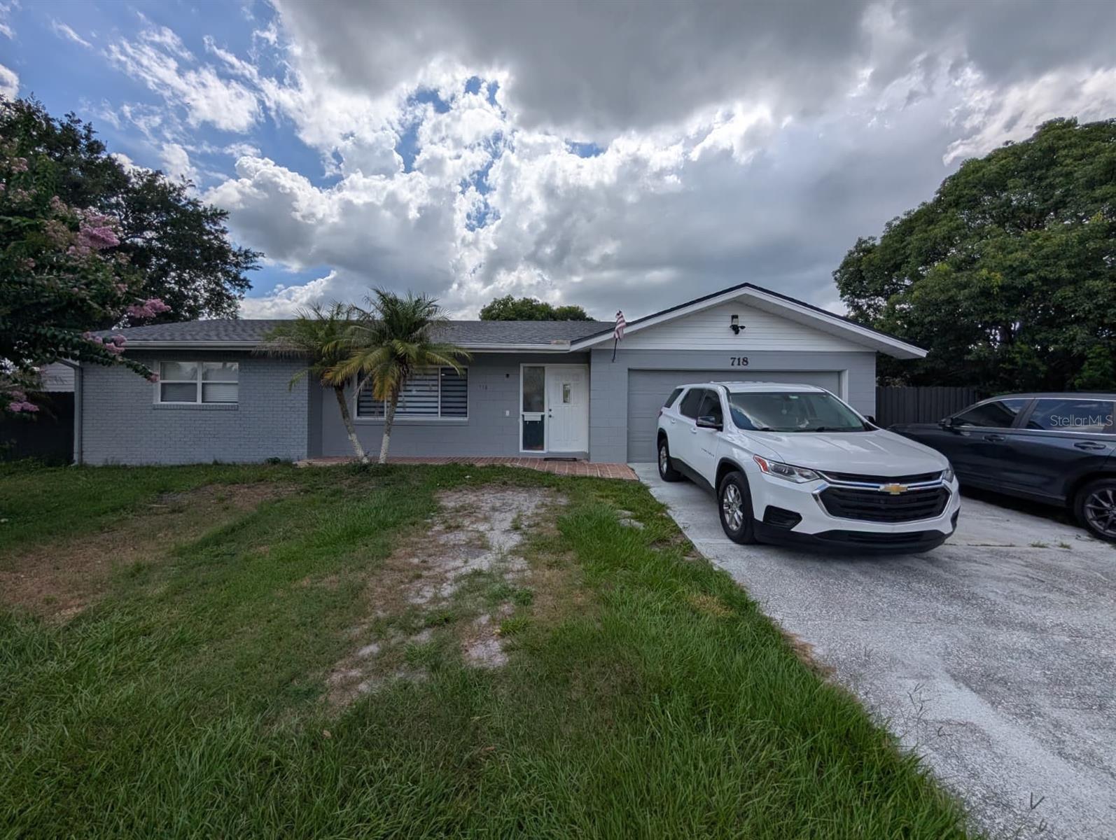 Beautifully remodeled property located at 718 Park Manor Dr, Orlando, FL 32825. This spacious 3-bedroom, 2-bathroom home offers modern finishes throughout, including glossy tile flooring, recessed lighting, a stylish updated kitchen with cabinetry, stone countertops, backsplash, stainless steel appliances, and an open living/dining layout. The property also features a detached approximately 1,000 sq. ft. workshop, plus two separate efficiency units, each with 1 bedroom, 1 bathroom, and kitchen area. Seller, all additions, efficiencies, and improvements are permitted and in compliance with Orange County. Major updates include roof, A/C, and water heater from 2025. Conveniently located near restaurants, shopping, storage facilities, hospitals, and major roads. A unique opportunity with multiple functional spaces and excellent potential.