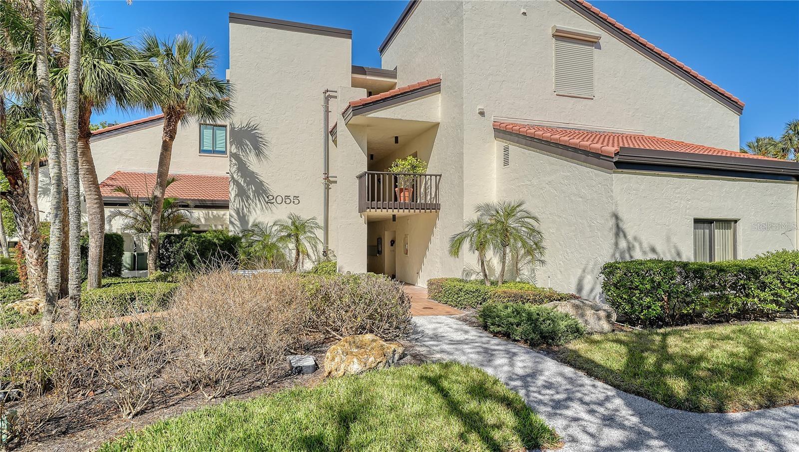 NEW PRICE ADJUSTMENT: Rarely available and a wonderful opportunity to own a three bedroom/two bath condominium located in a garden building with partial gulf views from all rooms. walk out to your lanai and enjoy the beautiful flowering trees & foliage. Bright and spacious with travertine tile and wooden flooring throughout, stainless steel appliances and cambria quartz countertops in the kitchen and both bathrooms.  Plantation shutters on all windows and ceiling fans in the bedrooms & lanai. Beautiful crown molding in the living area & stunning light fixtures throughout. Newly installed Hurricane windows in all rooms and the sliding glass door in the living area. Coming with two parking spaces, one covered and one uncovered. Located in the beautiful community of Seaplace on 42 acres of land right on the Gulf of America. There are many amenities to enjoy, a half mile of gorgeous beach, two swimming pools with spas, kiddie swimming pool and playground area, fitness room, sauna, clubhouse for entertaining and enjoying many social events.  Being on the south end of Longboat Key you are less than a mile to Publix, CVS & three different banks and only a few miles to famous Saint Armand's Circle where you will enjoy boutique shopping and fabulous restaurants and downtown Sarasota has a litany of options to enjoy as well, which includes Live Theatre, Opera, Ballet, Sarasota Orchestra, Art Galleries and not to leave out the variety of choices for dining and shopping.