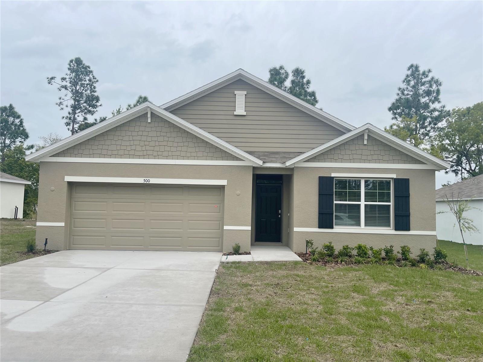 This beautiful house is located in Golf community Lake Diamond Ocala with the golf view with huge yard!! This all concrete block constructed, one-story layout optimizes living space with an open concept kitchen overlooking the living area, dining room, and the outdoor covered lanai.The well-appointed kitchen comes with all appliances, including refrigerator, built-in dishwasher, electric range, and microwave. The owner's suite, located at the back of the home for privacy, has an ensuite bathroom. Two additional bedrooms share the second bathroom. The third bedroom is located near the laundry room, which is equipped with included washer and dryer. Available to tour on or after 7/01/2026.