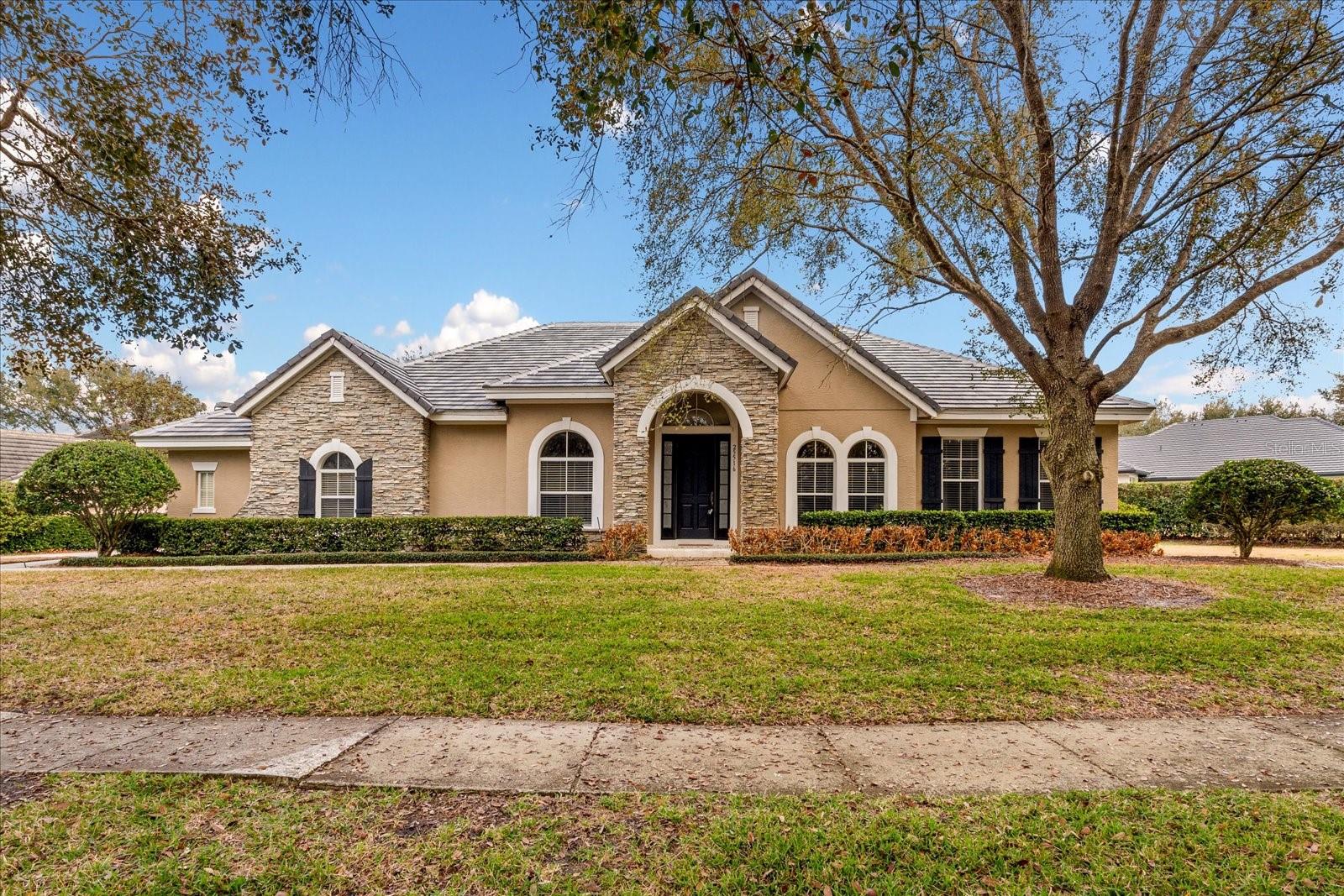 Welcome to this beautifully appointed home offering exceptional curb appeal from the moment you arrive, complete with a spacious three-car garage for added convenience and storage. NEW ROOF!! Go inside to discover an elegant formal family room and dining area that set the tone for refined living. The inviting living room features a stunning fireplace and serene views of the private backyard, ideal for relaxing or entertaining. The spacious kitchen is the heart of the home, designed with abundant storage, generous workspace, and a center island ideal for gatherings and everyday living. The polished and expansive primary suite provides a peaceful retreat, complete with a luxurious bathroom featuring a soaking tub, separate shower and an impressively large walk-in closet. Three additional bedrooms are comfortably sized, offering flexibility for family, guests, or a home office. The extended lanai creates a wonderful outdoor living experience, with cozy and intimate spaces ideal for weekend lounging or evening unwinding. In the exclusive RedTail golf community, residents enjoy premier amenities including a clubhouse, championship golf course, pools, fitness center and on-site dining, delivering the lifestyle you’ve been waiting for.