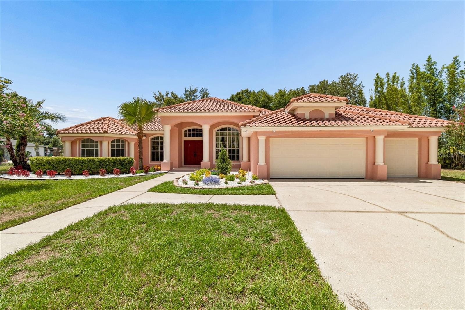 Beautifully renovated tile-roof estate situated on a private 3-acre lot in the heart of Riverview. This exceptional home offers 4 spacious bedrooms, 3 full bathrooms, and an oversized 3-car garage, combining peaceful country living with outstanding convenience. The open-concept floor plan features a spacious great room with soaring vaulted ceilings that create a bright, elegant, and inviting atmosphere. The oversized covered and screened lanai overlooks the expansive backyard, providing the perfect space for relaxing, entertaining, or hosting family and friends.
The home has been extensively updated with brand-new luxury vinyl plank flooring throughout the living areas and all bedrooms, brand-new kitchen appliances including the refrigerator, range, and dishwasher, and a one-year-old washer and dryer. The bathrooms have been refreshed with new sinks, faucets, a new primary bathroom toilet, and a beautifully renovated primary shower. Brand-new blinds and living room curtains have been installed, and both the interior and exterior have been freshly painted. The home also features a newer AC, newer water heater, and a water softener. The oversized 3-car garage includes a durable polyaspartic floor coating for a clean, finished appearance.
Serviced by a private well and equipped with a water softener, the property offers the benefits of softened water while providing substantial savings on monthly water bills. Located in a quiet community with no HOA, you'll enjoy the freedom to park your trucks, boats, RVs, trailers, and other recreational vehicles. The expansive 3-acre lot and beautiful circular driveway provide abundant parking for multiple vehicles and guests.
Tucked away on a peaceful cul-de-sac with a scenic pond directly across the street, this home offers a tranquil setting while remaining just minutes from everything you need. Schools, grocery stores, shopping, restaurants, banks, gas stations, and major highways are all within a 2- 10 minutes. With convenient access to I-75, I-4, and I-275, Downtown Tampa is approximately 15 minutes away, Tampa General Hospital is about 20 minutes away, and MacDill Air Force Base is approximately 30 minutes away. For added peace of mind, the home is equipped with a security system and motion-activated exterior lighting. This is a rare opportunity to lease a beautifully updated home offering space, privacy, modern upgrades, and an unbeatable Riverview location. Schedule your private showing today!