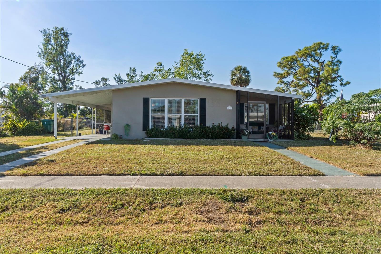 Welcome to this charming, fully furnished concrete block home on a canal, nestled in the heart of Port Charlotte! This well-maintained property offers a fantastic opportunity for first-time homebuyers, seasonal residents, or savvy investors looking for a turnkey home with no HOA or CDD fees. Featuring three bedrooms, including two with closets, plus a versatile den and one full bathroom, this home offers a functional layout with comfortable living spaces and distinct living and dining areas. The property sits on a beautiful canal waterfront lot with mature landscaping and a spacious backyard, providing the perfect setting for entertaining, relaxing, or future expansion opportunities. Additional features include updated windows, a well-maintained roof, an attached carport, and a convenient laundry/storage room. The home is truly move-in ready and offers excellent potential as a full-time residence, seasonal retreat, or rental investment. Enjoy low-maintenance Florida living with easy access to everything Port Charlotte has to offer — including nearby beaches, fishing, boating, golf, and more. Located in a quiet, established neighborhood, you’ll be just minutes from hospitals, schools, shopping, dining, and everyday conveniences, with quick access to US-41 and I-75. Whether you’re looking to settle into your own Florida home, add to your investment portfolio, or enjoy a furnished getaway, this property offers comfort, convenience, and opportunity. Schedule your private showing today!