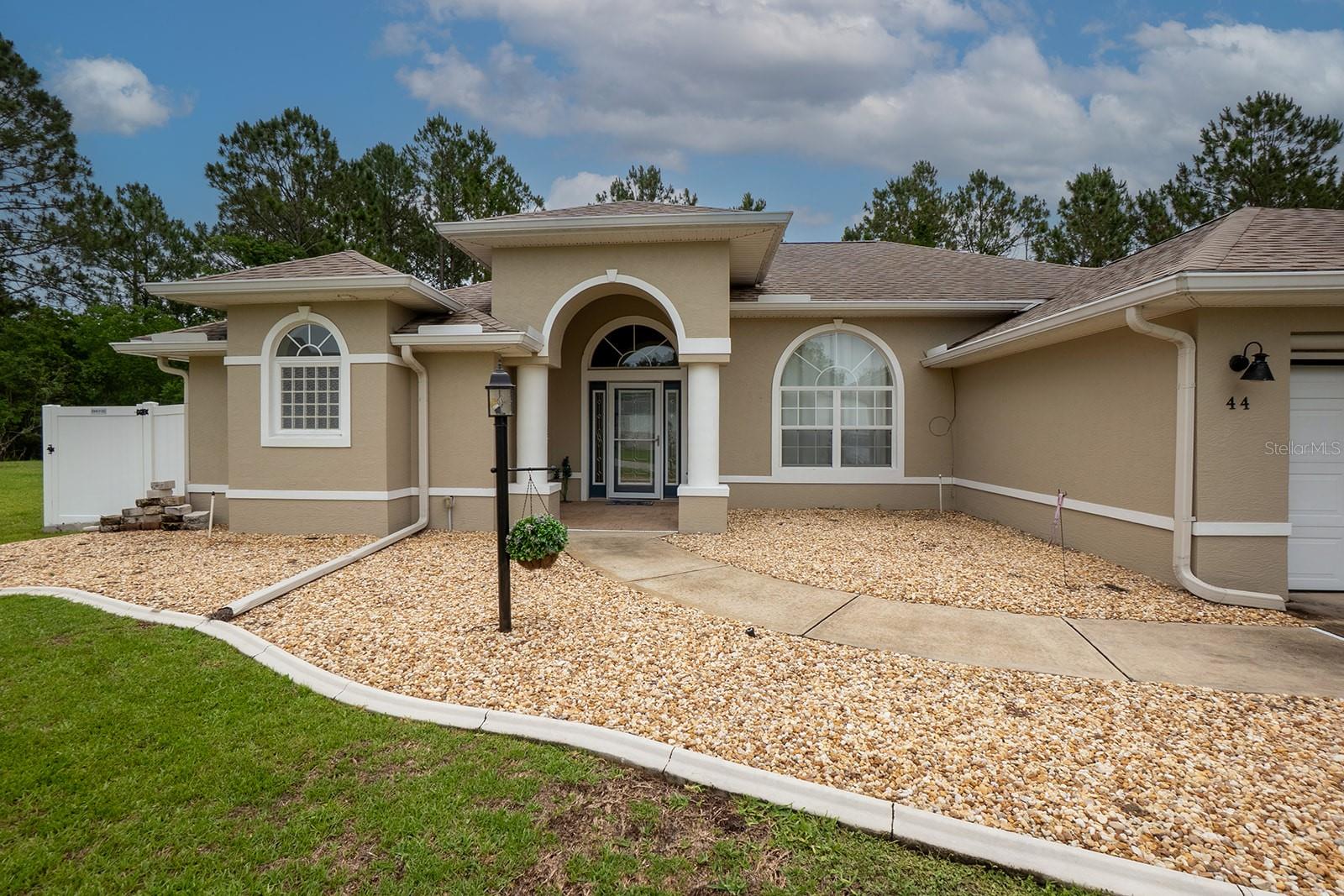 Step into this beautifully updated 4BR/2.5BA home with an open concept and vaulted ceilings. The kitchen space, with new granite countertop installed in 2019, will make it a pleasure to food prep or enjoy your favorite beverage.  Step outside through the new Pella slider (2024) onto the resurfaced pool deck (2022), covered by a screen, to cool off after your favorite activity.  As you move through the home, you will appreciate the LVP flooring (2021) throughout, except for the kitchen and bathrooms, which are tile.  The Pella windows were also replaced in in 2024, giving you a clear perspective on the day.  All of the vital components have been brought forward with the Carrier A/C and HWH installed in 2021.  The exterior is ready for any type of weather, with the 2019 roof and 2020 gutters.  Ring cameras are installed at the front door and back yard for peace of mind.  Matanzas is a unique community with beautiful homes and a large green space with many trees.  The beach is a mere 20 mins. away, and the schools have excellent ratings.  Take the first step to your new Florida lifesyle, and make this home your new paradise.