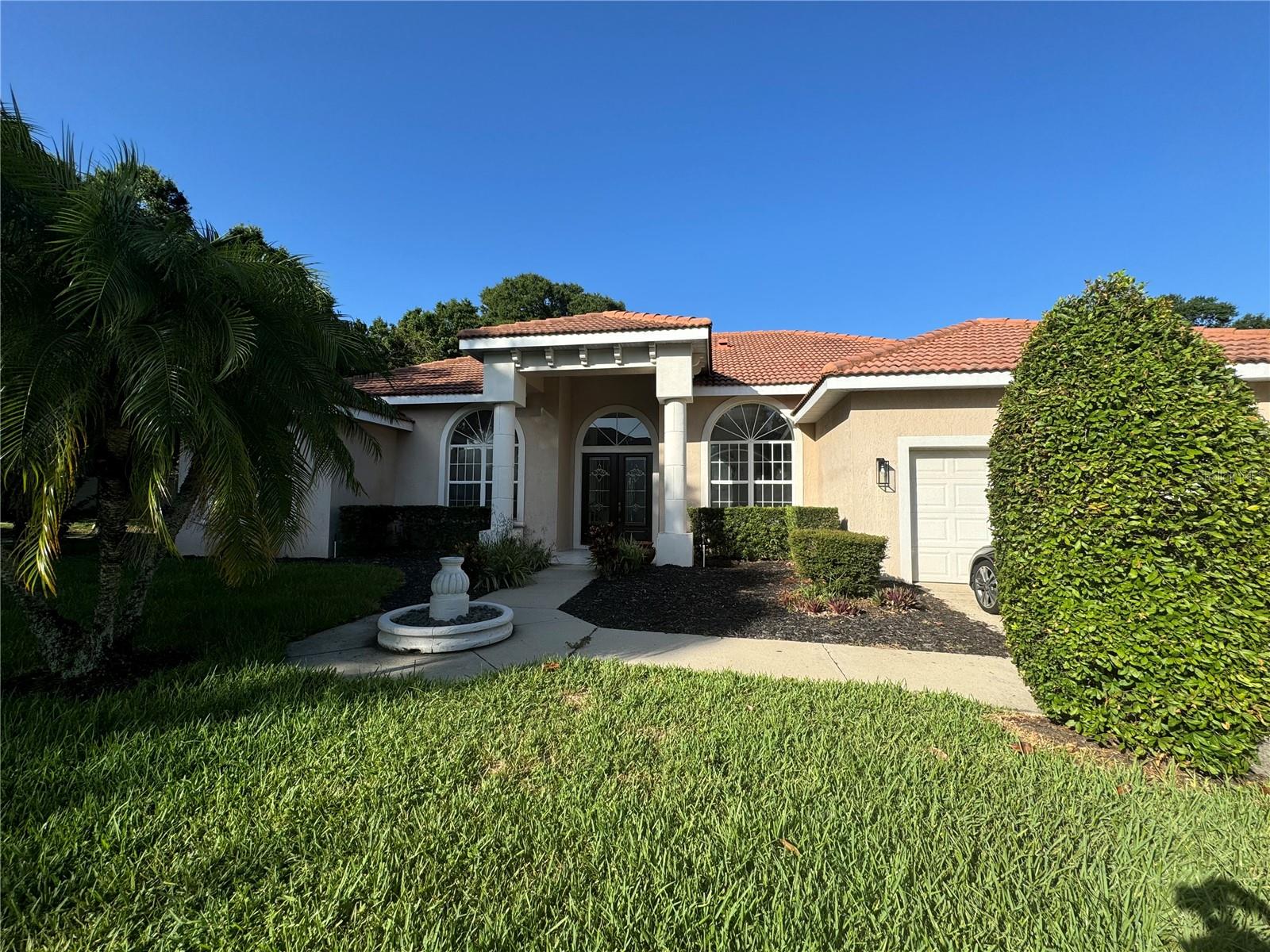 BAY HILL HOME for rent! LOCATION, LOCATION, LOCATION! Welcome to your dream home located in Arnold Palmer's Bay Hill Golf Club Community! Located in one of Orlando's hottest zip codes, with a 10 to 20-minute drive to all the theme parks, the airport, and downtown, and just over an hour from the beach, this home offers the perfect blend of luxury and unparalleled convenience. Walking distance to famous Restaurant Row, 10 minutes from Universal, Epic Universal, and Conference Centre, 15-20 minutes to Disney parks and Disney Springs, everything you need is right at your fingertips. Nestled on a tree-lined corner lot of a private cul-de-sac street, this renovated four individual Suite split floor plan home features four world-class luxury bathrooms individually connected to each bedroom. Modern kitchen featuring elegant quartz countertops, offering both style and functionality, perfect for cooking and entertaining. The master suite is a true retreat with a huge shower equipped with a luxurious rainhead. Open kitchen, family, living, formal dining, and other areas o/er cathedral 14' ceilings throughout with natural light. Additional features include upgraded Bosh appliances, fresh paint inside, modern ceiling fans, and more. Beyond the double French doors, an outdoor summer kitchen, large TV, and pool are an entertainer's paradise, ideal for gatherings and outdoor enjoyment. Don't miss this rare opportunity to enjoy a luxury home in one of the most desirable Orlando locations.