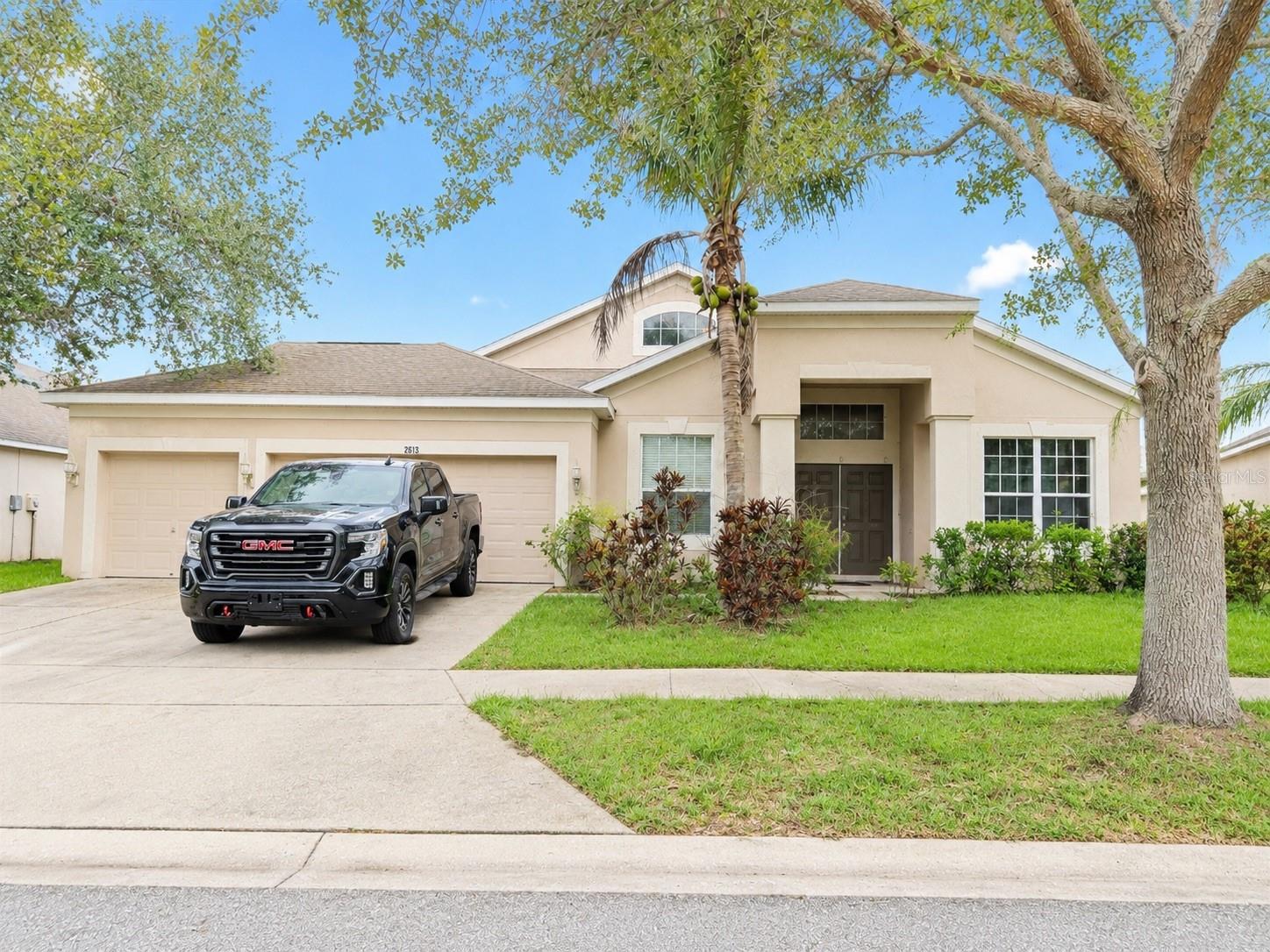 Virtually Staged. Short Sale. Short sale. Photo has been virtually edited. 2613 Yukon Cliff Dr, Ruskin, FL 33570 | 4 Bedrooms | 3 Bathrooms | 2,595 Sq Ft | River Bend | Welcome to a spacious, well-kept home offering the perfect blend of comfort, functionality, and value in the desirable River Bend community. This well-maintained residence features a highly sought-after split-bedroom floor plan with over 2,500 square feet of living space, including formal living and dining rooms, a spacious family room, and an open kitchen complete with maple cabinetry, a center island, walk-in pantry, and abundant storage. The oversized primary suite offers an extended walk-in closet and an en-suite bath with dual vanities, a relaxing garden tub, and separate shower, while three additional bedrooms and two full bathrooms provide plenty of room for family, guests, or a home office. Interior details include ceramic tile flooring throughout the main living areas, elevated lighting, faux wood blinds, a water softener, security system, and all major appliances—including the refrigerator, washer, and dryer. Step outside to the lanai overlooking the spacious backyard, perfect for relaxing or entertaining. Conveniently located just minutes from I-75, shopping, dining, schools, and Florida's beautiful Gulf Coast, this home offers an incredible opportunity to own a spacious property in excellent condition within an established community.