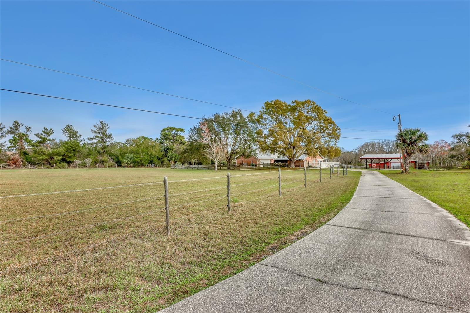 MOTIVATED SELLER!! Welcome to your picture-perfect homestead, a sprawling 3-bedroom, 3-bathroom home offering over 3,000 square feet of living space and set on nearly 7 acres of land—an idyllic setting for making memories and endless possibilities. Whether you're looking for room to grow, space for hobbies, or a serene place to call your own, this home delivers. This large property is ready to meet any family's vision. With 7 acres at your disposal, you can create your dream landscape, bring your horses, and explore countless outdoor activities right in your own backyard. Imagine gathering around a bonfire, hosting summer barbecues, or simply enjoying the tranquility of your private land. There's truly no limit to what you can do here. The home itself is a perfect blend of comfort and functionality. Featuring two spacious master bedrooms—one conveniently located on the first floor—this home is ideal for growing families or multi-generational living. The first-floor master can also serve as a perfect in-law suite, offering privacy and convenience. Upstairs, you'll find a versatile flex room, whether you need an office, a playroom, or an additional living space, the options are endless. The sellers have lovingly cared for this home for nearly 22 years, and it's ready for its next chapter with you. Bring your personal touches, make your vision a reality, and create the home you've always dreamed of. Don't miss the chance to own a property where both your family and your imagination can truly flourish. Come see it today and begin your next adventure!