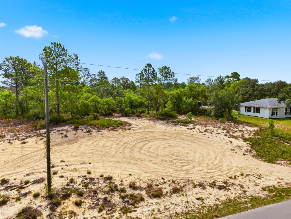 Looking for a place to build without the hustle of city life? This beautiful 0.50-acre homesite offers the perfect opportunity to create your own Florida retreat in the peaceful Walk-In-Water community of Lake Wales. Surrounded by natural beauty and wildlife, you'll enjoy the quiet country setting while still being close to shopping, dining, medical facilities, and everyday conveniences. With plenty of room for your dream home, outdoor living space, and all your recreational toys, this property provides the flexibility to design the lifestyle you have been envisioning. Whether you're looking for a full-time residence, seasonal getaway, or investment opportunity, this lot offers endless potential. 
An OPTIONAL, LOW-COST HOA membership is available and provides access to the community boat ramp and clubhouse, making it easy to enjoy everything this lake-oriented community has to offer.
