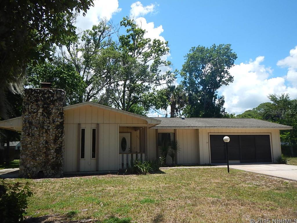 ENDLESS POTENTIAL FOR THIS 3 BED/2 BATH HOME  LOCATED ON A TRIPLE LOT IN FLORIDA SHORES.  THE LIVING ROOM FEATURES A BEAUTIFUL STONE FIREPLACE.  LARGE DINING ROOM WITH PASS THRU WINDOW FROM KITCHEN.  OVERSIZED 2 CAR GARAGE FOR YOU CARS OR TOYS. MATURE TREES LOCATED IN THE BACK YARD MAKE FOR A PERFECTLY SHADED REAR YARD AND SCREENED PORCH. THIS HOME IS PRICED TO SELL, DON'T MISS OUT!! MEASUREMENTS ARE APPROXIMATE, ALL INFORMATION RECORDED IN THE MLS IS INTENDED TO BE ACCURATE, BUT CANNOT BE GUARANTEED. SELLER HAS NEVER OCCUPIED PROPERTY AND NEITHER WARRANTS OR GUARANTEES CONDITION OF PROPERTY. ;Water: City
