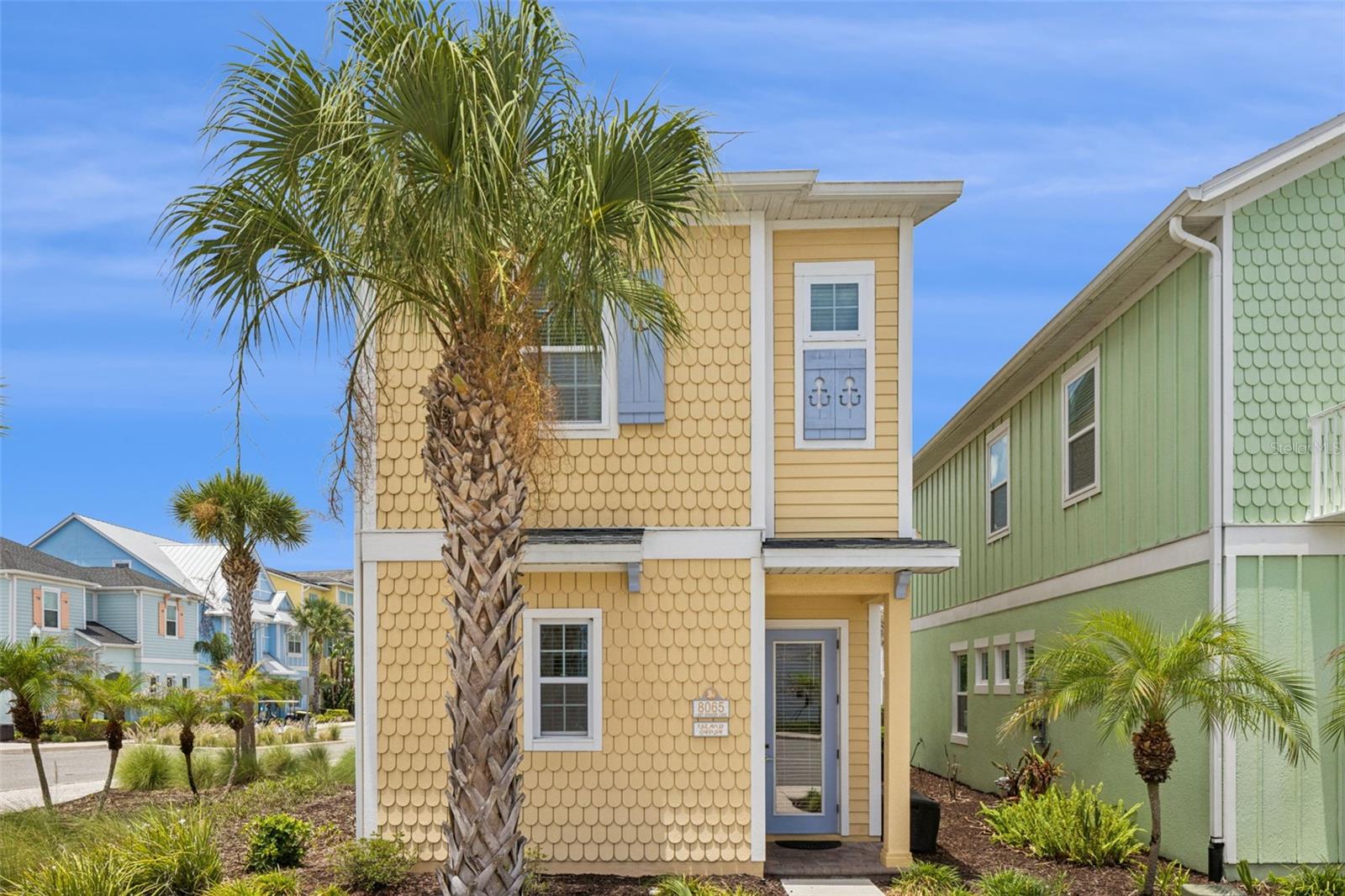 TURNKEY VACATION RENTAL | FULLY FURNISHED | INCOME PRODUCING | MINUTES FROM DISNEY Welcome to paradise at 8065 Lost Shaker Lane, an exceptional fully furnished, income-producing vacation home located within the highly sought-after Margaritaville Resort Orlando. Whether you're searching for a high-performing short-term rental investment, a luxury second home, or a personal vacation retreat that generates income while you're away, this turnkey opportunity checks every box. Perfectly positioned in one of Central Florida's premier vacation destinations, this beautifully maintained cottage offers strong rental appeal, resort-style amenities, and an unbeatable location just minutes from Walt Disney World, Universal Studios, Epic Universe, championship golf, shopping, dining, and Orlando International Airport. Designed with both owners and guests in mind, this spacious 4 bedroom features the highly desirable dual primary suite layout with private owner's suites on both the first and second floors, an increasingly sought-after feature for vacation rental guests and multi-generational travelers. The open-concept design is filled with natural light and showcases soaring ceilings, designer finishes, quartz countertops, stainless steel appliances, upgraded cabinetry, and the popular "Son of a Sailor" interior package. The seamless flow between the kitchen, dining, and living spaces creates the ideal environment for entertaining, gathering, and relaxing after a day enjoying Orlando's world-famous attractions. Step outside and discover your own private tropical retreat. The beautifully paved patio, lush landscaping, and above-ground hot tub provide the perfect setting for guests to unwind, boosting both enjoyment and rental appeal. Every detail has been thoughtfully curated to deliver the ultimate Florida vacation experience. Being sold FULLY FURNISHED and completely turnkey, the home includes furniture, décor, artwork, televisions, housewares, linens, kitchen essentials, window treatments, and more. This allows  the next owner to immediately continue operations as a successful vacation rental or begin enjoying the property from day one. Ownership includes access to one of Florida's most exciting resort communities. Margaritaville Resort Orlando offers multiple resort-style pools, fitness center, water park access, concierge services, entertainment venues, and the vibrant Sunset Walk district featuring restaurants, bars, live music, shopping, nightlife, family attractions, and year-round events. Vacation homes with proven income potential, premium resort amenities, and a location this close to Disney continue to be in high demand among investors and second-home buyers alike. Whether you're looking to expand your real estate portfolio, secure a luxury vacation home, generate passive income, or enjoy the Margaritaville lifestyle, this rare opportunity delivers exceptional value and endless possibilities. Live where others vacation. Invest where guests return year after year. Schedule your private showing today.