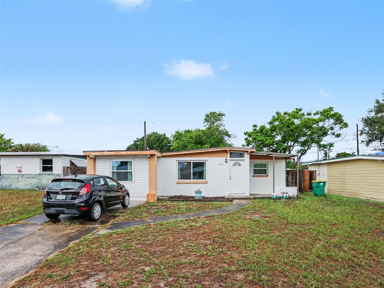 Incredible opportunity in the heart of mid-Pinellas County! This solid concrete block 2BR/1BA home in Orange Lake Village is a prime find for savvy investors, downsizers, or first-time buyers looking to build equity. Featuring a highly functional split-bedroom layout, a versatile interior utility/bonus room, and a fully fenced backyard with a shaded northern exposure, the bones and footprint are exactly what buyers look for. Located in the unincorporated county zone (hello, lower property taxes! New 2026 Elecrical and plumbing redone.