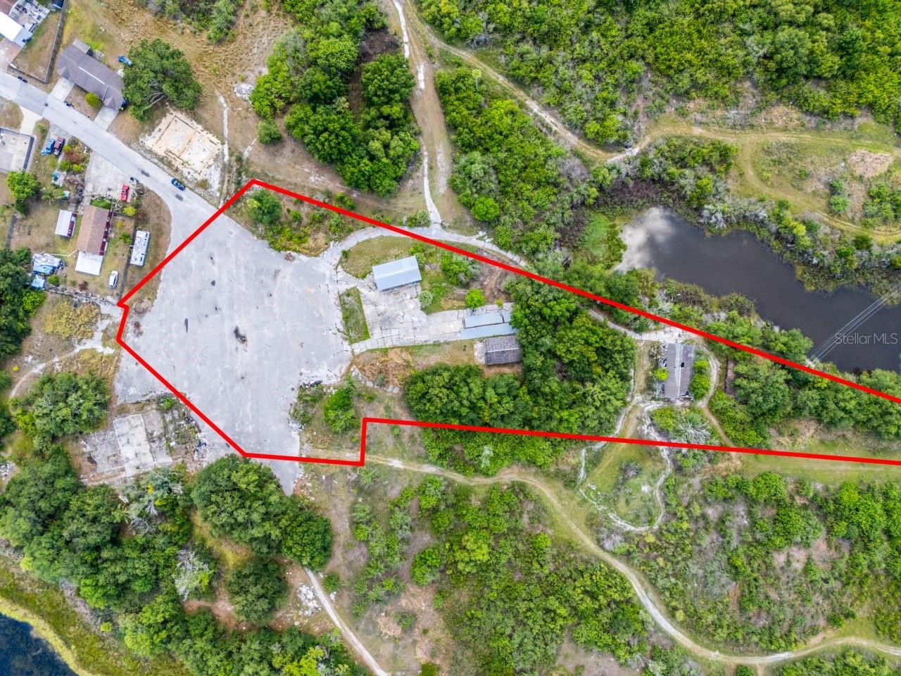 Rare Lakeland redevelopment opportunity situated on approximately 2.72 acres at 1100 Skyview Blvd, Building 1, Lakeland, FL. This property offers a strong blank canvas investment opportunity for builders, investors, developers, or owner-users looking for land with long-term upside in the growing Polk County market. The existing buildings are in older, run-down condition, making the true value of this property the land, location, and future potential. With a reported Commercial General land use code and RS zoning, this site can have flexibility for a buyer willing to explore redevelopment, renovation, adaptive reuse, or future commercial possibilities, subject to county/city approval. Positioned in Lakeland, one of Central Florida’s growing markets, this 2.72-acre commercial land opportunity provides room for vision, repositioning, and value-add potential. Whether you are looking for a Polk County development opportunity, a future owner-user site, or a value-add real estate investment, this property gives you the canvas to create something new.