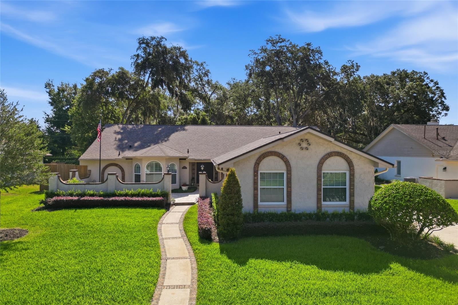 Welcome to this stunning, fully renovated 4-bedroom, 3-bathroom residence with a dedicated home office, perfectly situated in on of the most desirable areas near Winter Park. Every detail of this turnkey home has been thoroughly updated, creating a seamless blend of luxury, comfort, and modern convenience. 
Step inside to find beautiful wood-look tile flooring throughout and an open, inviting floor plan designed for both everyday living and entertaining. The Chef's kitchen features a gas stove, high end appliances and a wine fridge. The kitchen island has extra storage underneath the gorgeous high level granite countertop. The flows effortlessly into the main living spaces. 
Major updates provide peace of mind, including new roof (2021), newer windows, and newer AC.  Skylights throughout the home fill the interior with natural light, enhancing the bright and open feeling of your next home. 
The outdoor living space is truly exceptional. Enjoy year-round entertaining on the luxurious covered patio featuring a decorative ceiling, skylights, newer brick pavers, and a fully equipped outdoor kitchen with a built-in-grill.  The screened in pool, beautifully updated to include a swim up for lounging, is the centerpiece of this private backyard retreat, surrounded by a lush landscape that creates a resort-style setting.
Ideally located close to shopping, dining and entertainment. This home is zoned for A-rated schools and provides convenient access to some of Central Florida's finest restaurants and amenities. 
This is a rare opportunity to own a meticulously updated, move-in-ready home that perfectly combines elegance, functionality, and an unbeatable location.  Call to schedule your private showing today.