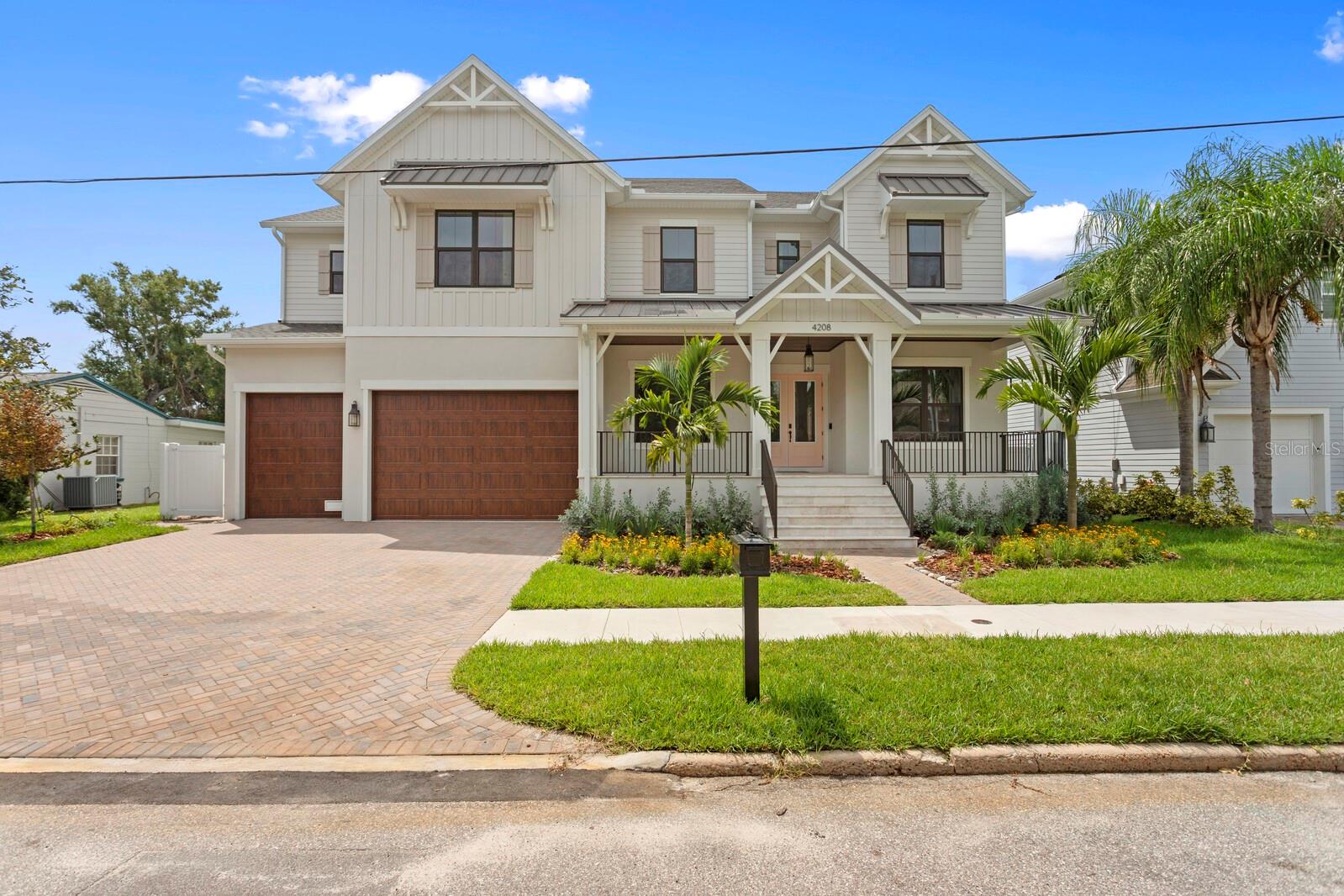 Virtually Staged. This stunning New Legacy Home features the best of what any builder has to offer!  Located in the heart of South Tampa in the Maryland Maor neighborhood of the Plant HS district, this home has it all!  Five full bedrooms including a downstairs guest suite, two offices (one upstairs and one downstairs,  a bonus/recreation room, a media room. And a 3 car garage!  This Energy Star beauty offers a perfect blend of luxury and energy efficiency.  Past the double door entry is a study the right and formal dining room with tray ceiling and wine display on your left. The foyer then opens up to an expansive family room with soaring  20+ ceilings gas fireplace, and open stairwell to the second floor.  The kitchen boasts upper stacked cabinets to the ceiling and an oversized pantry that can be used for food prep.   With high end Thermador appliances  and  large island that can easily seat four, this gourmet kitchen has everything for the most acquired chef!  The primary suite is located on the ground floor with an enormous walk-in closet, free standing soaker tub, large shower,  and split vanities with plenty of drawer space.   The ground floor also has a separate guest suite with a full bath that doubles as the pool bath.  The first of two laundry rooms is also on this level.  Moving to the second floor, there is a large recreation/game room with a kitchenette that is perfect for entertaining and includes a beverage cooler, microwave drawer, and dishwasher.  Behind the game room is a dedicated media room to watch all your favorite sports and movies.  Three separate guest bedrooms – all with walk-in closets, and full bathrooms are also on this level.  Finally, a second laundry room and second home office are also on this level.  French doors lead from the family room to an expansive covered lanai with outdoor kitchen and plenty of room for multiple patio sets.  Steps going down lead to the luxurious saltwater and pebble tech heated spa & pool below with plenty of back yard left over.   Other features includes: gas generator; elevator shaft and pre-wire for future use; Icynene spray foam insulation; impact windows and doors; and so much more!  See the full list of upgrades, floor plans, and sample finishes in the images.   Minutes from shopping, Hyde Park, Bayshore, MacDill AFB, Tampa International Airport, downtown Tampa and the bridges leading to St. Petersburg/Clearwater.   Don’t miss out on the opportunity to own this brand new South Tampa gem!