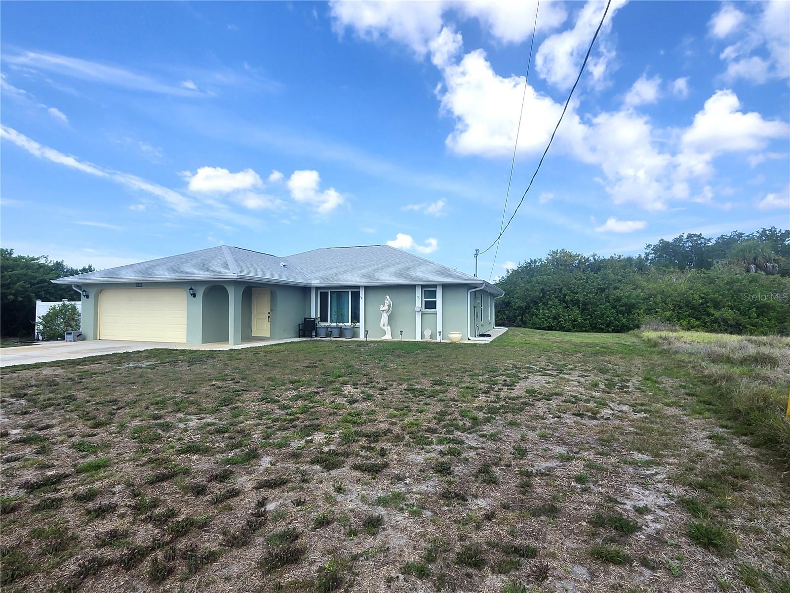 Huge Price Reduction.....Beautifully remodeled 3/3/2 water front home located on a branch of the Myakka River. The open concept home is great for entertaining and as you enter the home you will notice the flow, from entry to kitchen to family room, from the large dining room to living room. It’s a great layout for anyone. This home sits on an oversized lot offering 70 feet of water front and plenty of room to add a designer pool.  Home offers a newly designed kitchen, new appliances, recessed lighting, bathrooms, roof in 2024, A/C 2021, new garage door, water heater 2021, Impact windows and sliders. The kitchen has new soft close cabinets, quartz counter tops and new appliances. A large breakfast bar that will seat four, the Island and the breakfast nook offers additional seating.  Decorative ceramic tile throughout the home is pleasing to the eyes. The Owners suite is very large and offers space for a sitting area or office space. New crystal fan/light, and  ceramic flooring. The ensuite bathroom has a large walk in closet,  walk-in shower, crystal lighting above vanity and new luxury water proof vinyl flooring.  The second bedroom offers a private bath room and could act as a second master suite. The third bedroom is very large and is adorned with new impact windows allowing nature and water views to be seen from almost every angle. There is a permitted shed platform that is 30x11.5 that can be rebuilt or used for outdoor entertaining. Enjoy your water access of the Myakka leading to the gulf with a small boat or kayaks. Senator Bob Johnson’s Landing is a short drive and offers a kayak launch, picnicking and fishing.  You can also enjoy some of the best beaches within thirty five minutes. Close to medical, shopping, dining, entertainment and more.