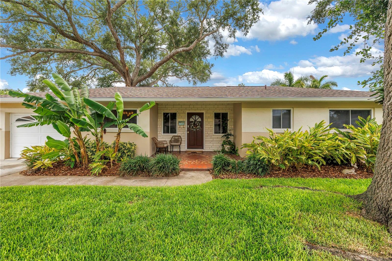 Welcome to this beautifully updated, pool home in the highly desirable Harshaw neighborhood! Ideally located just minutes from vibrant downtown St. Petersburg and the stunning Gulf Beaches, this exceptional 3-bedroom, 2-bath, 1-car garage residence offers the perfect blend of comfort and Florida lifestyle you have been waiting for. Step outside to your private oasis with sparkling swimming pool which is surrounded by lush tropical landscaping and is the perfect setting for relaxing or entertaining. Thoughtfully updated throughout, the home features major improvements including a roof (2019), HVAC system (2021), hot water heater (2022), electrical panel (2026), refinished pool deck (2024), new pool equipment (2025) and numerous interior cosmetic features. The home is situated on the Disston Ridge, one of the highest elevations in Pinellas County. A NON-FLOOD zone area. Enjoy morning walks to peaceful Leslee Lake, where neighbors and their four-legged friends gather, adding to the warm sense of community that makes Harshaw so special. Whether you're looking for a primary residence or a seasonal retreat this meticulously maintained home is move-in ready TODAY!