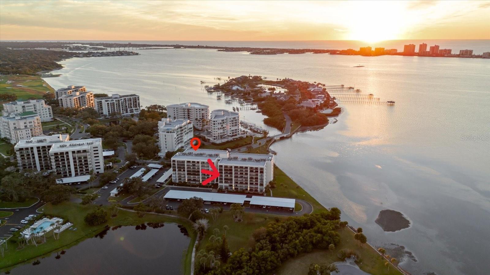 One or more photo(s) has been virtually staged. Welcome to 100 Oakmont Lane #507, a beautifully refreshed 2-bedroom, 2-bath corner residence in the gated and prestigious Belleair Country Club community. From the private balcony, enjoy peaceful views of Harold Lake with scenic sightlines toward the Intracoastal Waterway, where bird watching is exceptional and nature provides a tranquil daily backdrop. This desirable corner location enhances both privacy and natural light. Covered parking is included.

This light-filled home features a full interior repaint, smooth ceilings with popcorn removal, and a crisp, clean feel—truly move-in ready. The kitchen has been thoughtfully refreshed with a light update, offering a clean and functional space ready for everyday living.

Residents enjoy access to the newly renovated clubhouse, featuring a pool that is a continuous 86 degrees year-round, overlooking the Intracoastal Waterway. Optional membership to Belleair Country Club offers golf, tennis, pickleball, state of the art gym, dining, and a vibrant social calendar—with the rare opportunity to bypass the typical five-year waitlist.